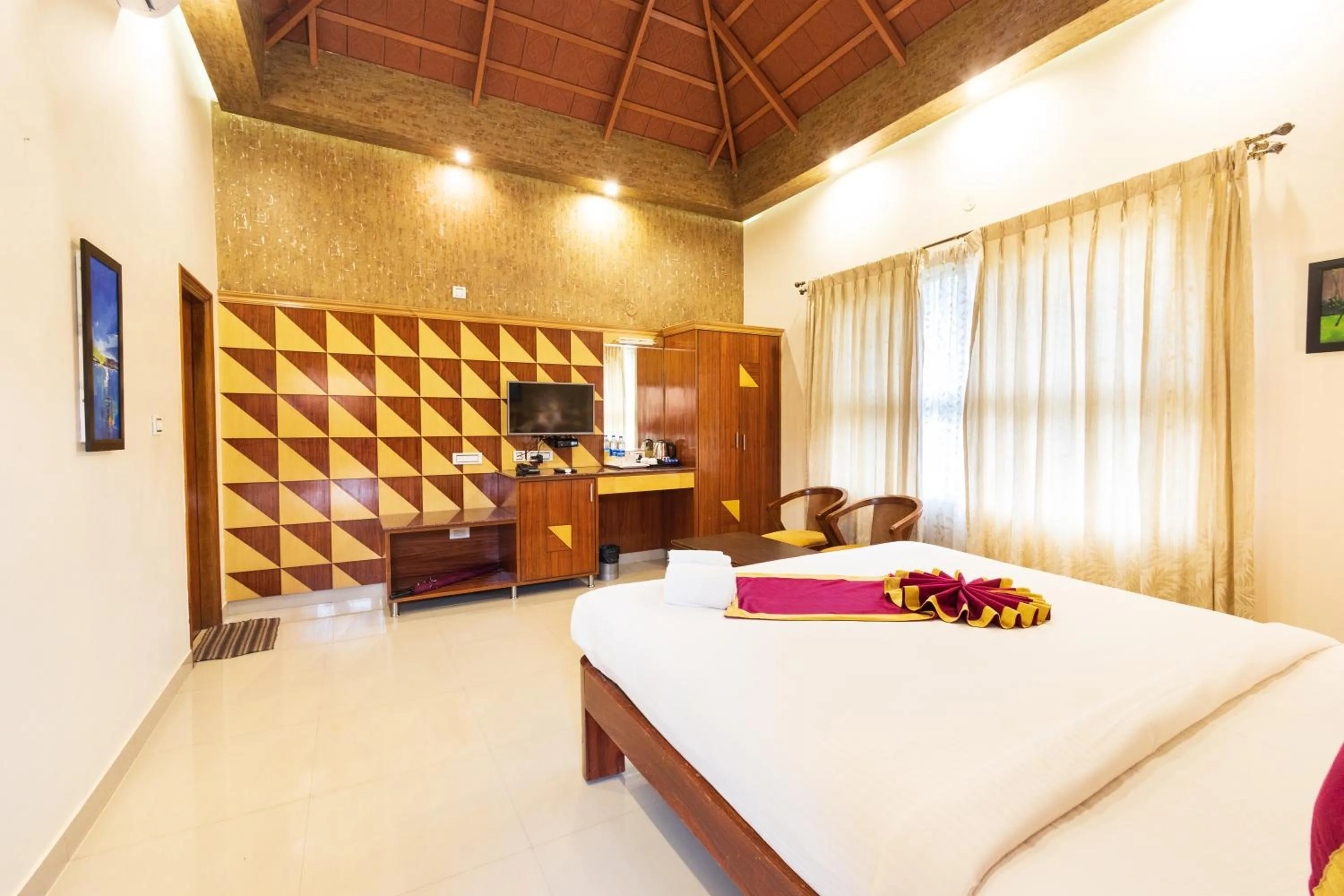 Bed in IBC Honeydew Exotica Resort