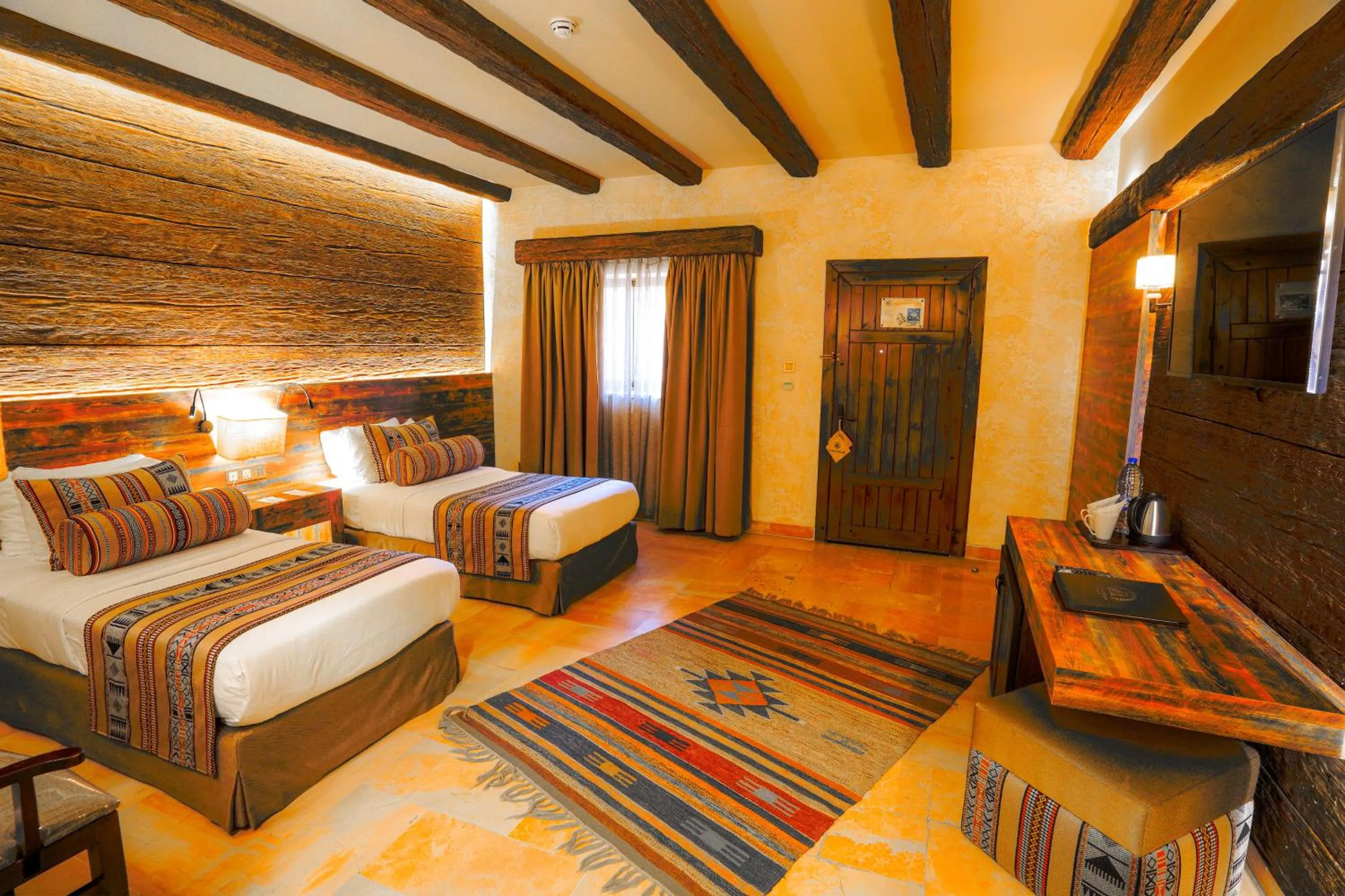 Bed in The Old Village Hotel & Resort