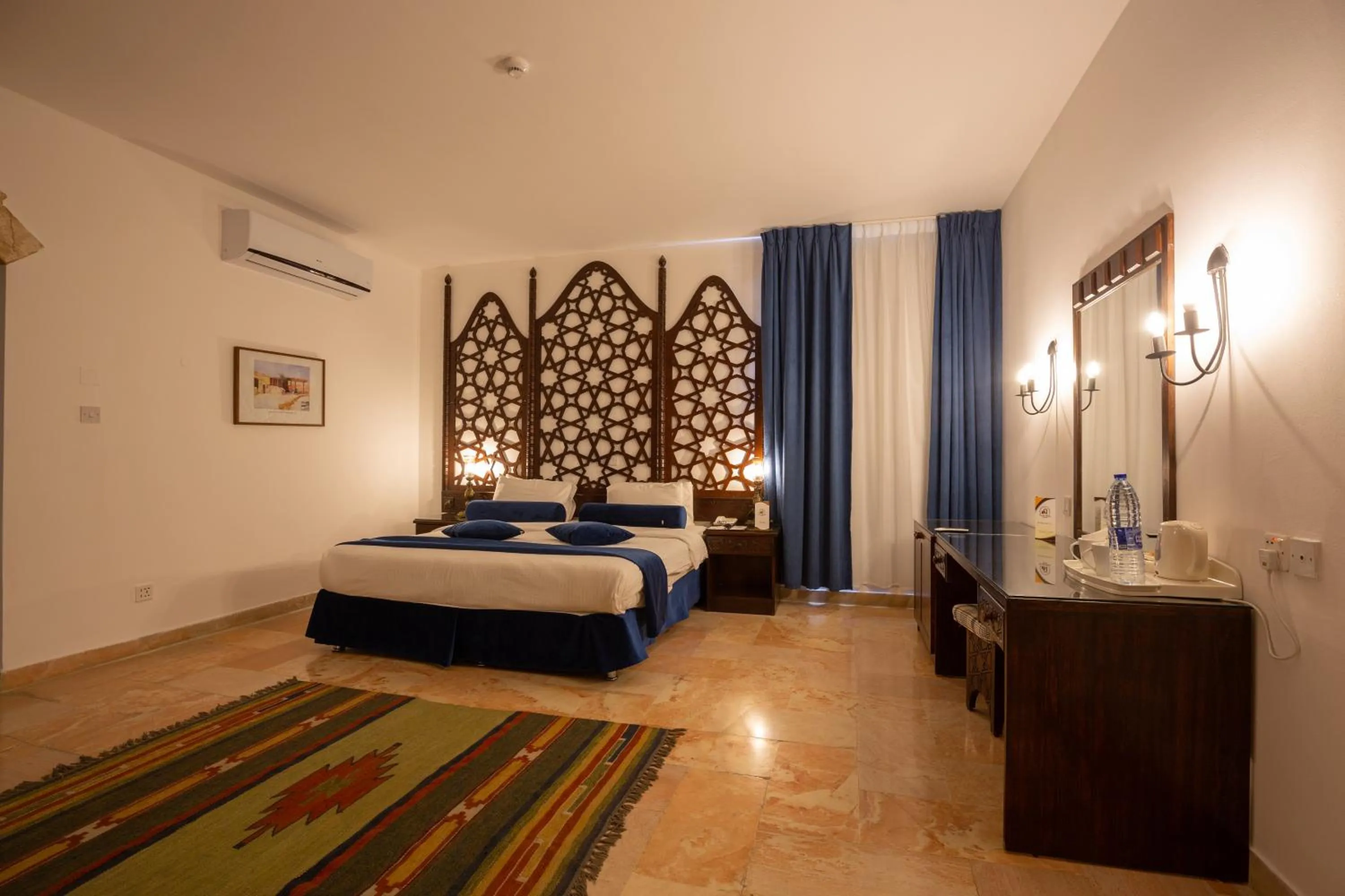 Bed in The Old Village Hotel & Resort