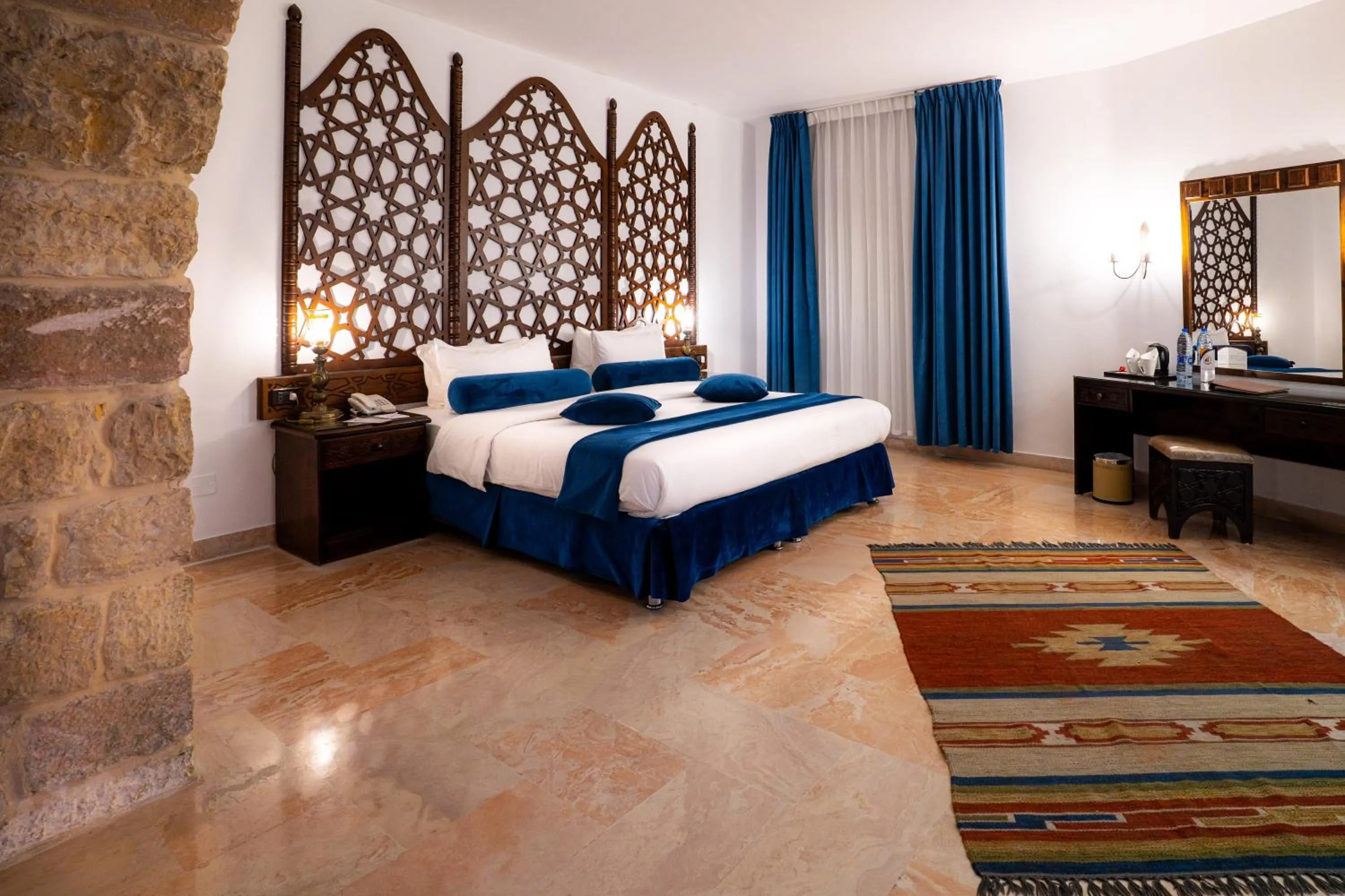 Bed in The Old Village Hotel & Resort