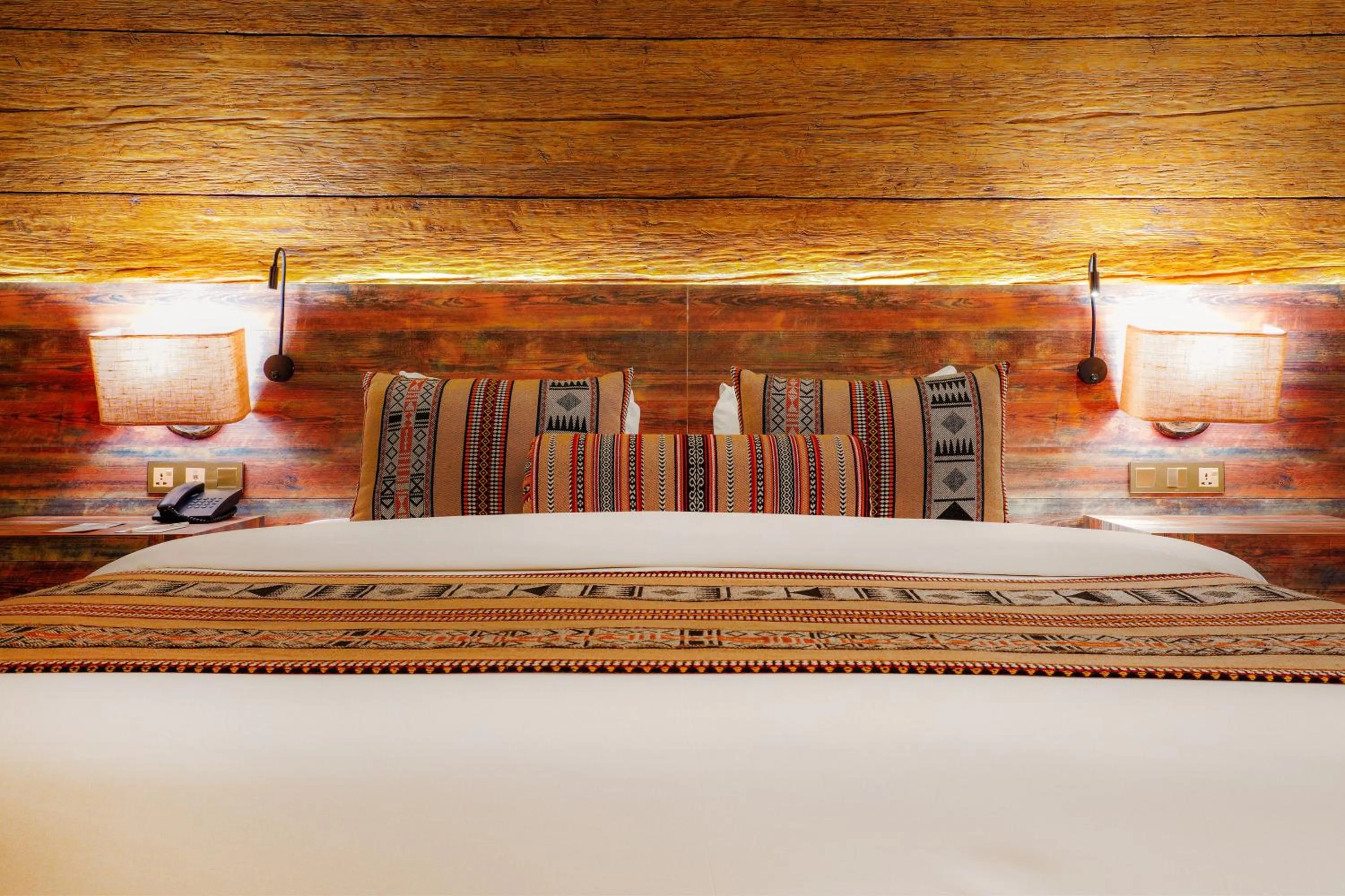 Bed in The Old Village Hotel & Resort