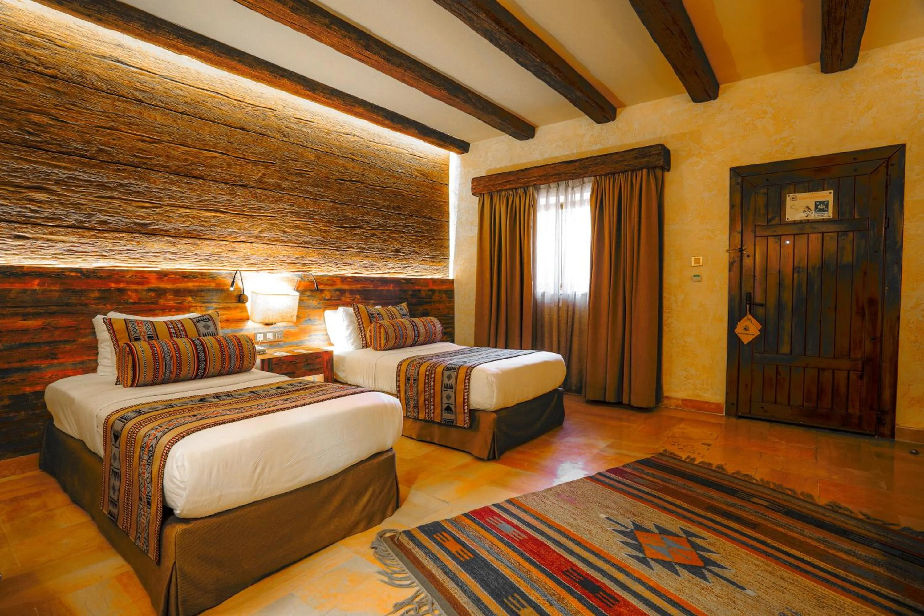 Bed in The Old Village Hotel & Resort