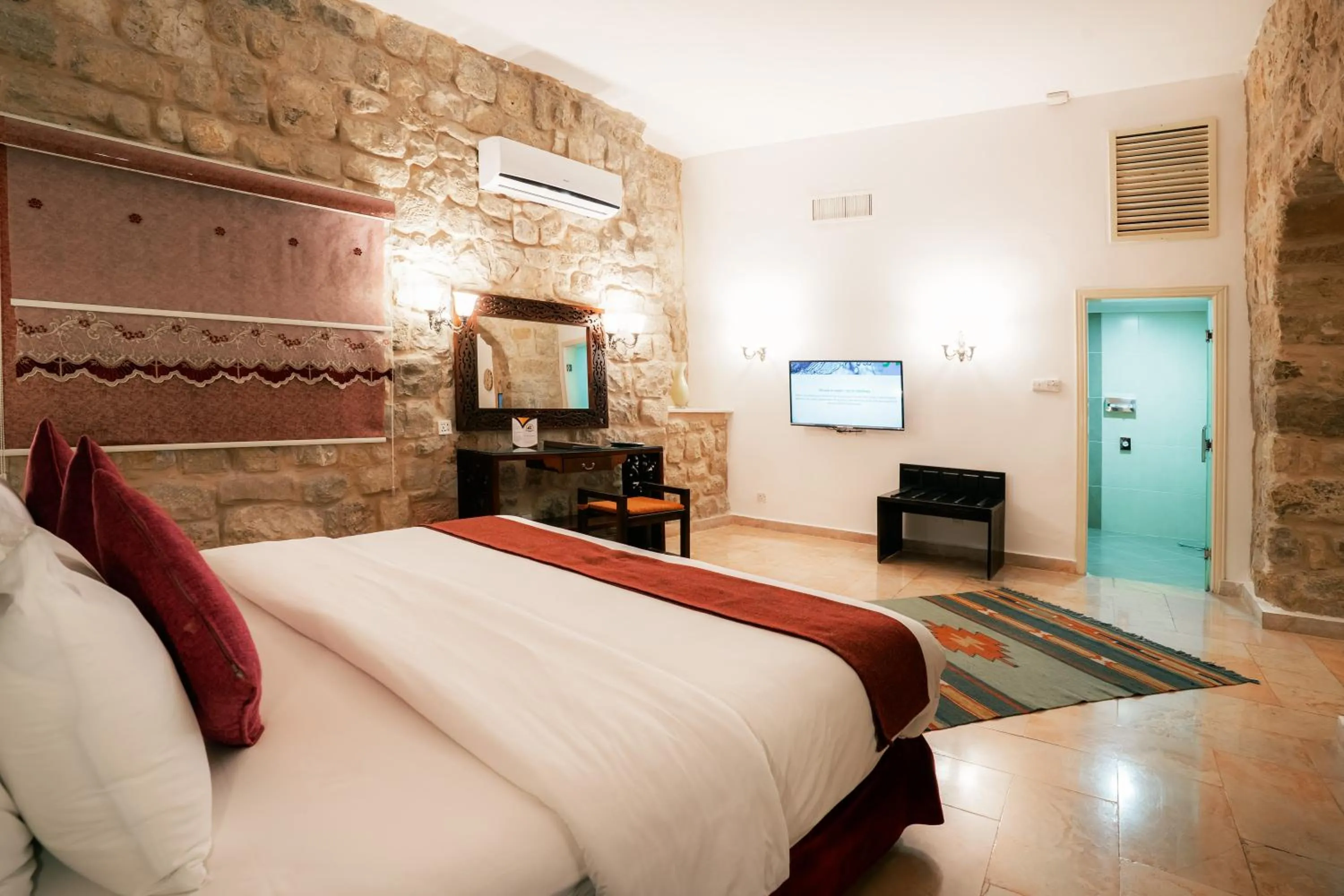 Bed in The Old Village Hotel & Resort