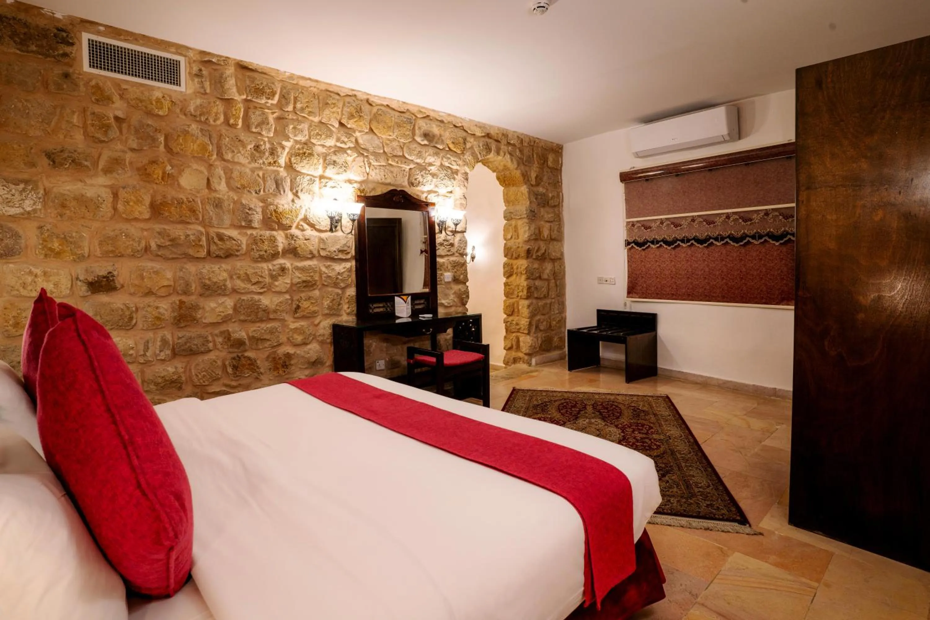 Bed in The Old Village Hotel & Resort