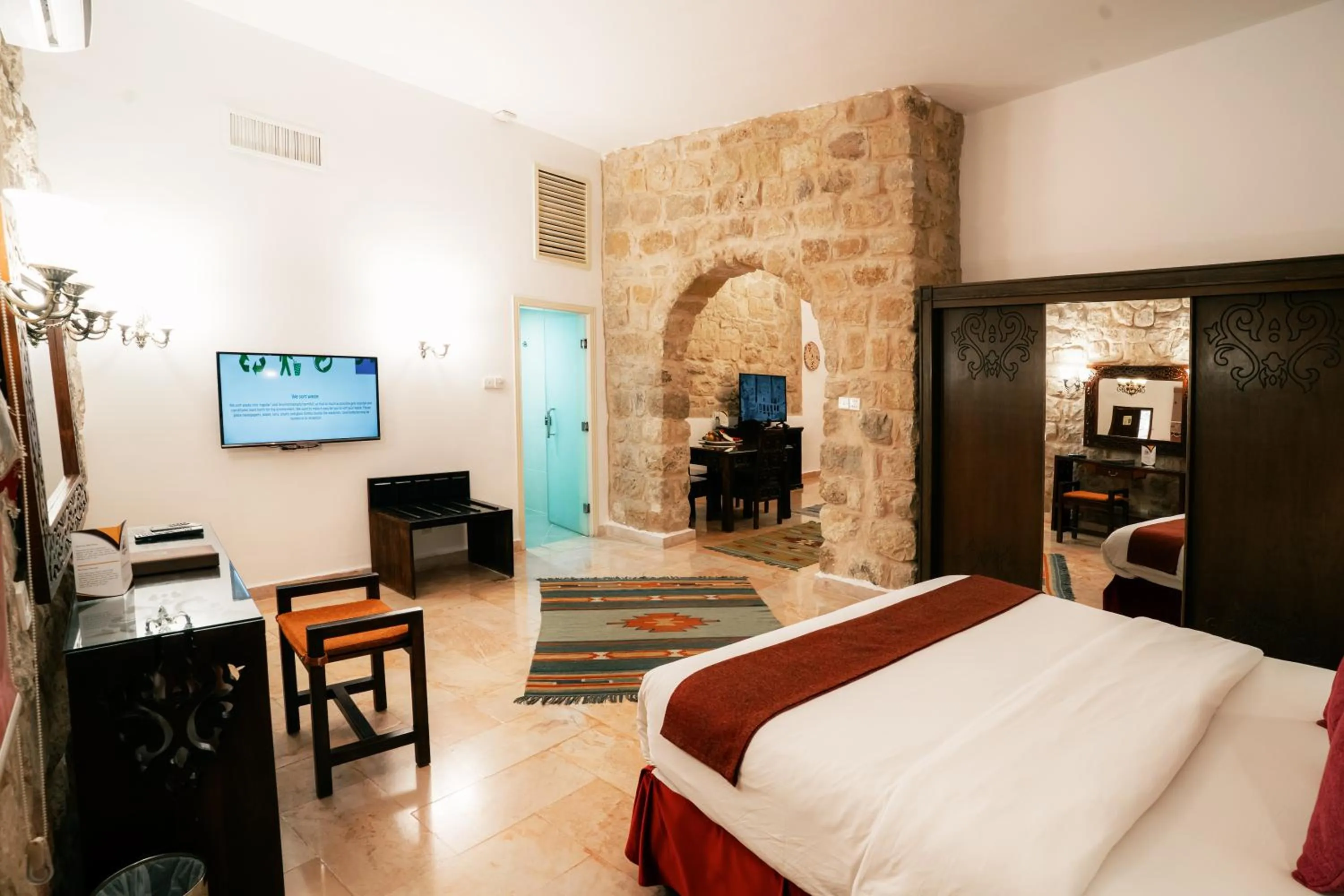 Living room, Bed in The Old Village Hotel & Resort