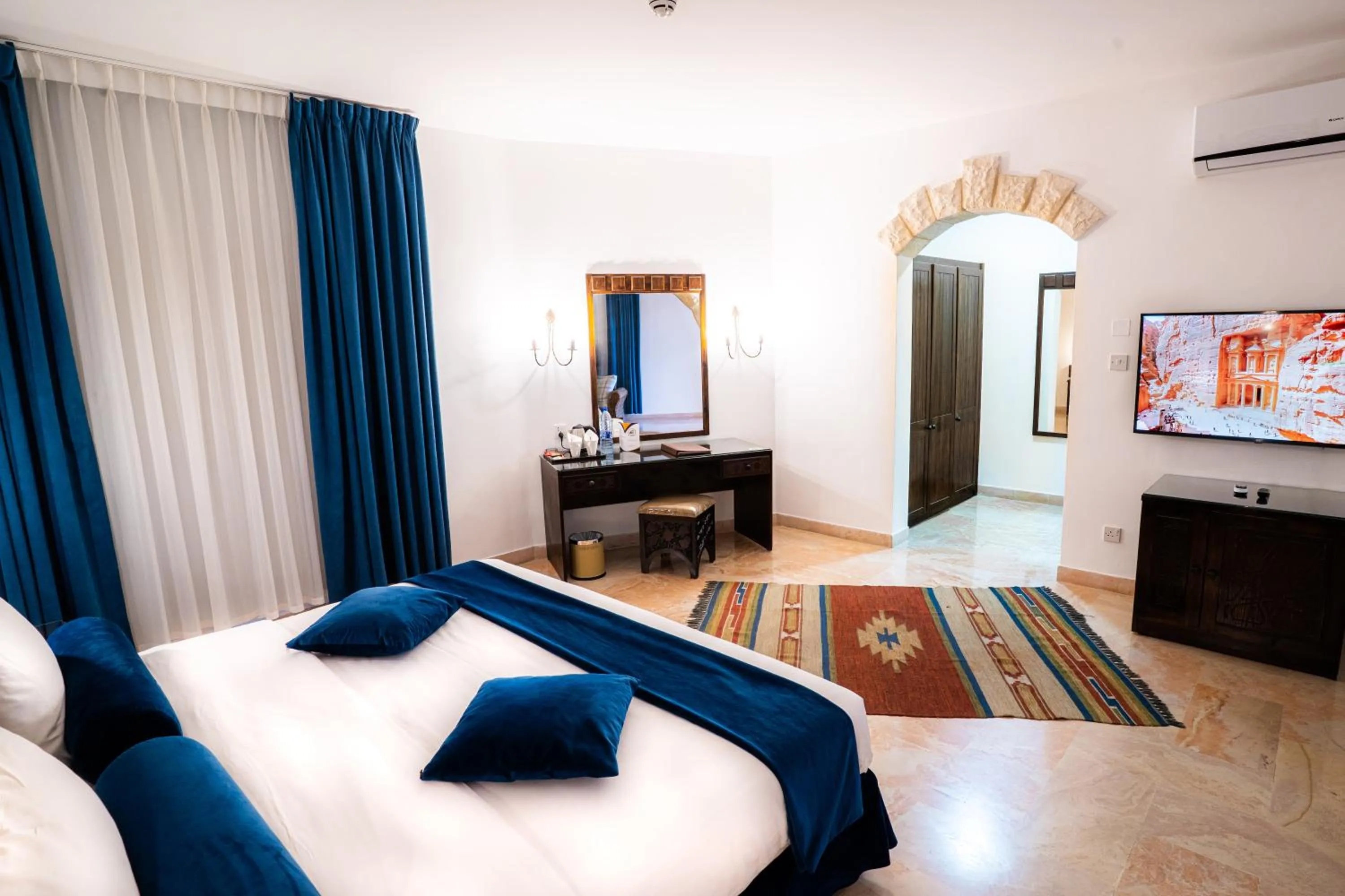 Bed in The Old Village Hotel & Resort