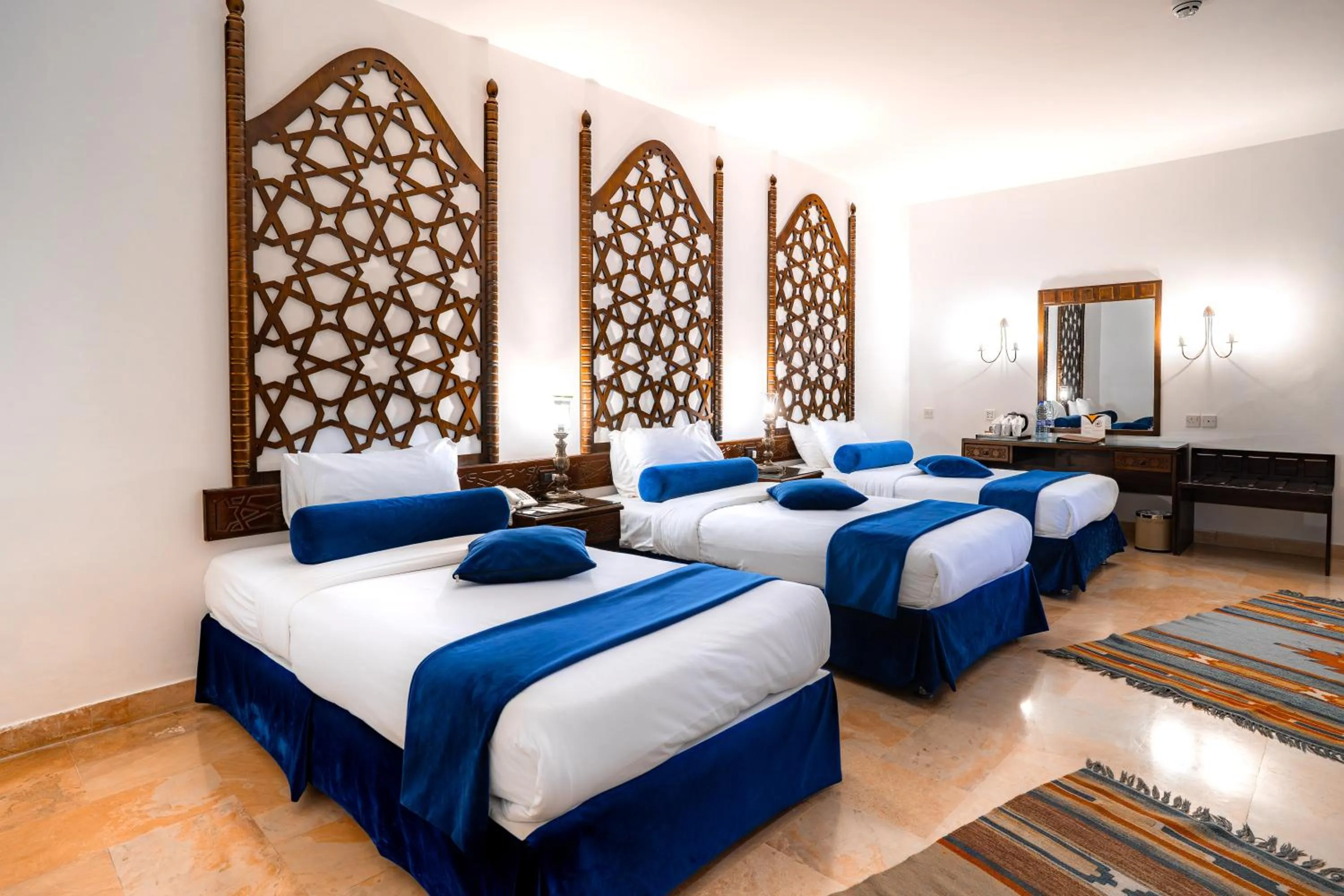 Bed in The Old Village Hotel & Resort