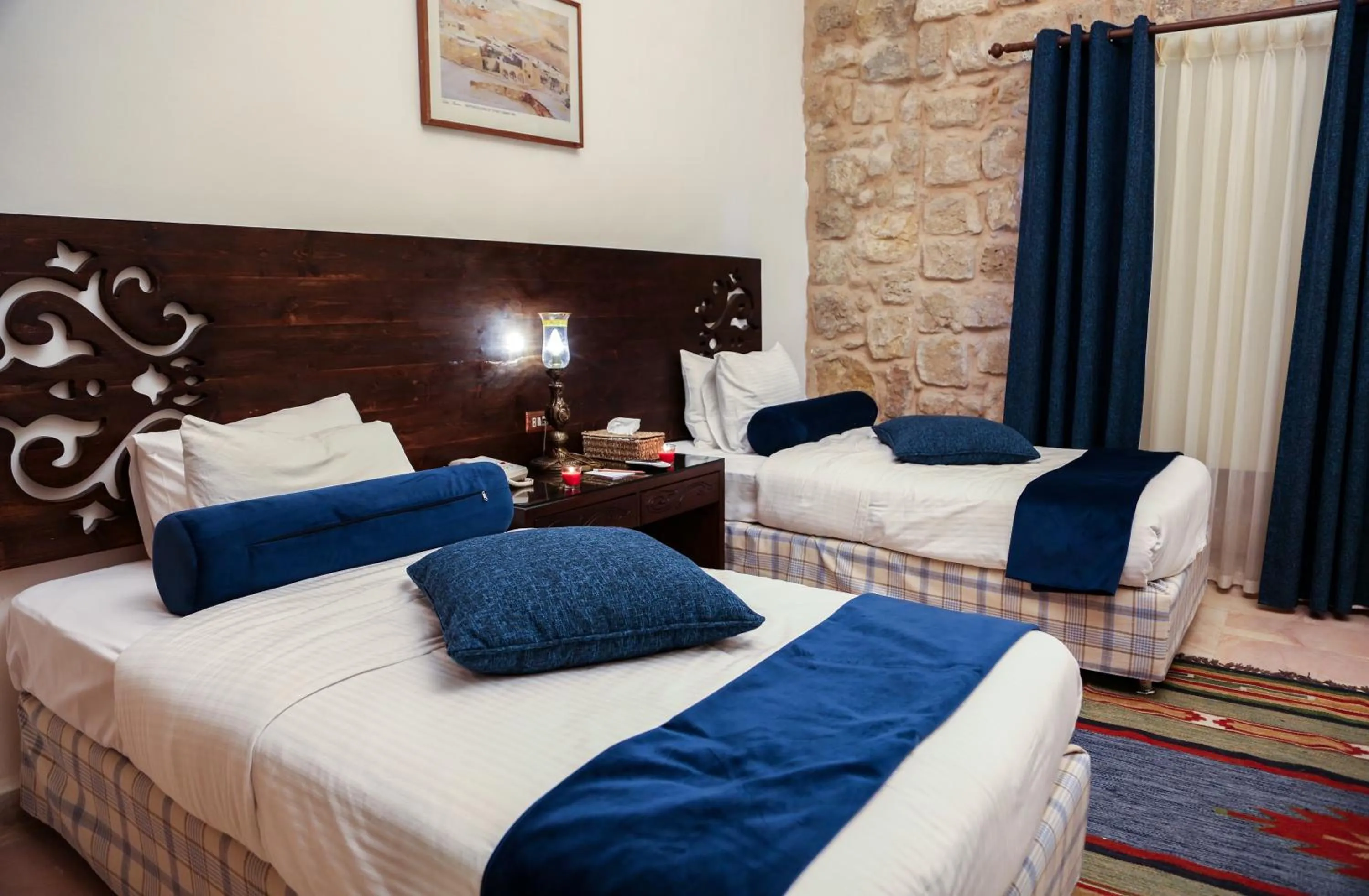 Bed in The Old Village Hotel & Resort