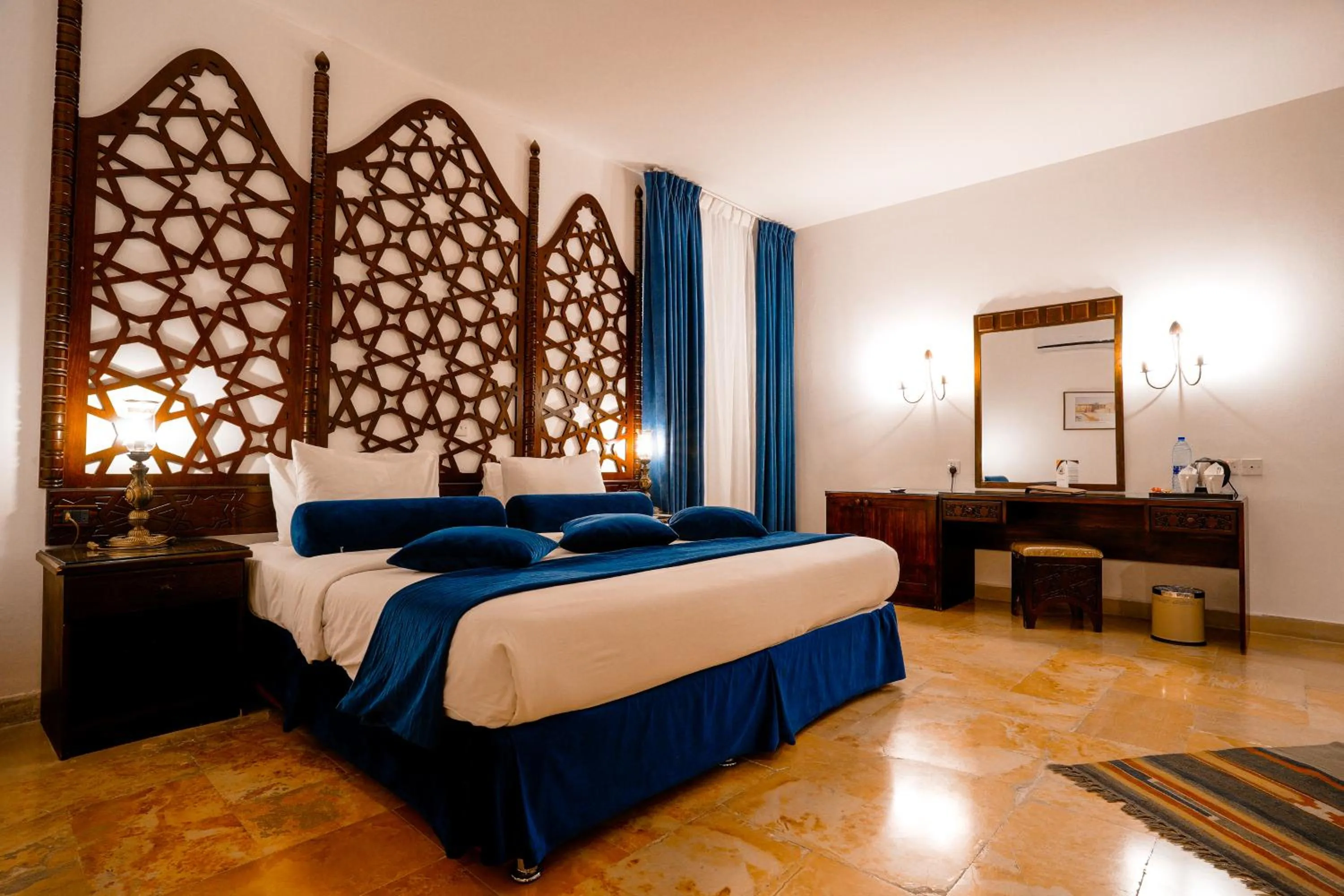 Bed in The Old Village Hotel & Resort