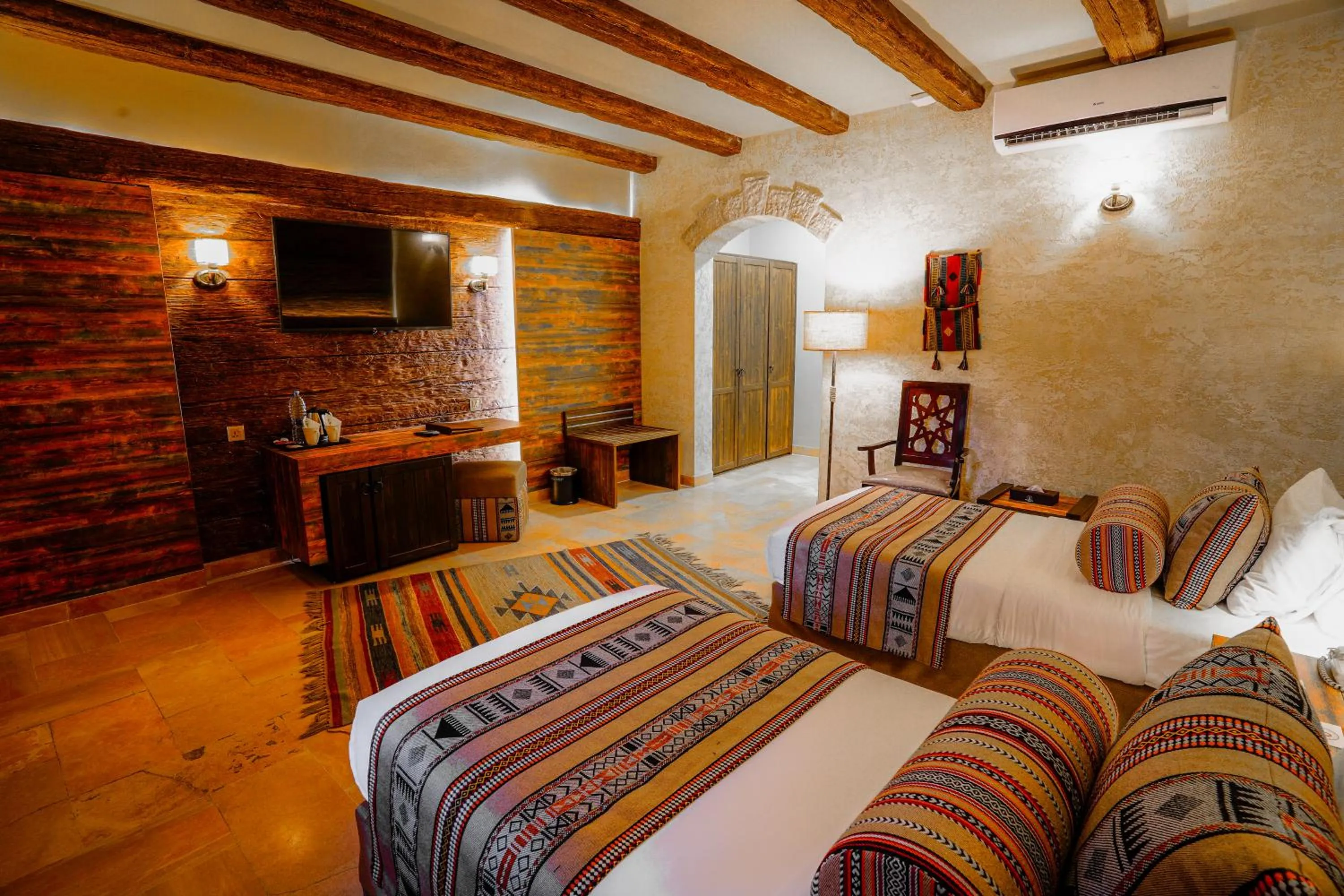 Bed in The Old Village Hotel & Resort