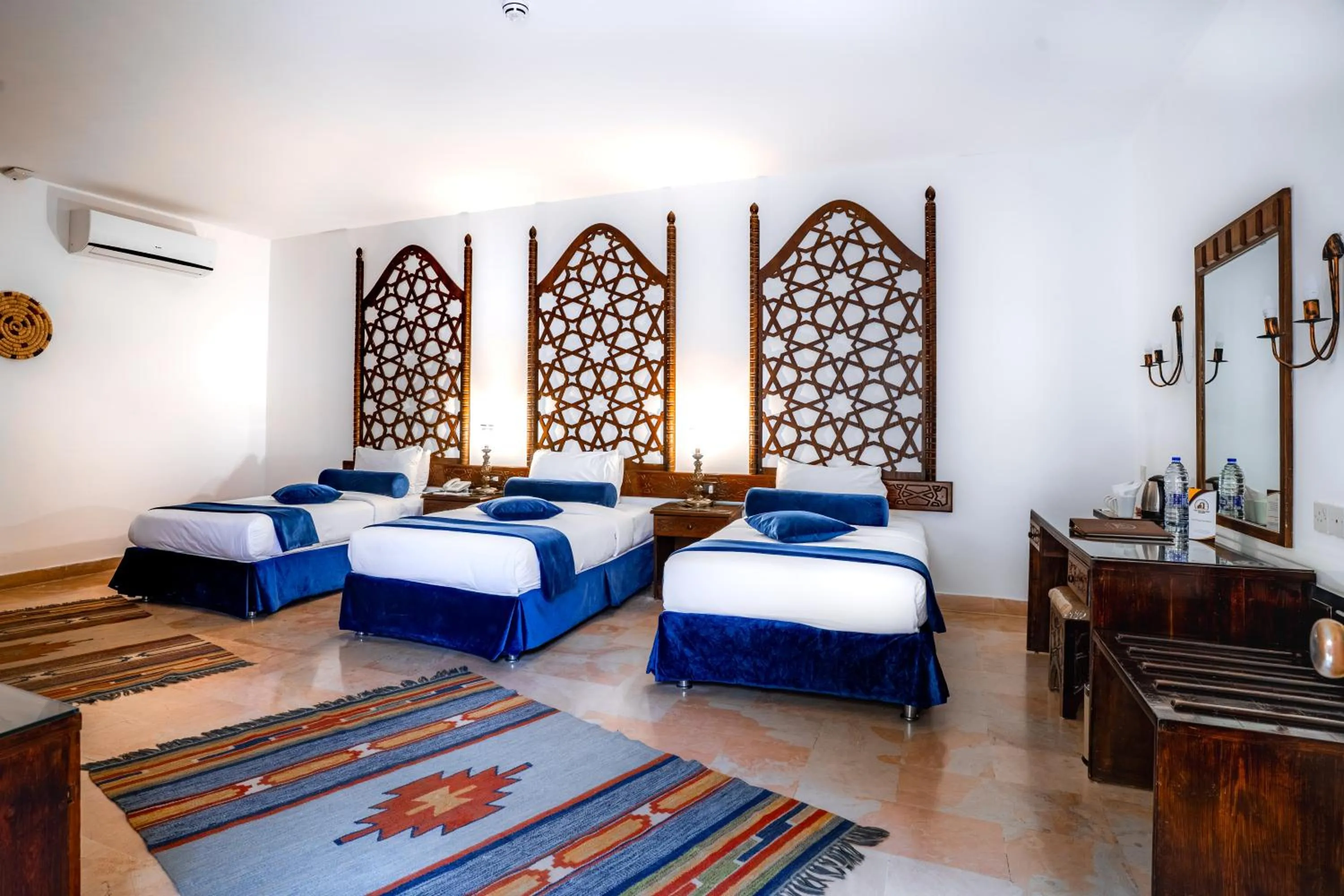 Bed in The Old Village Hotel & Resort