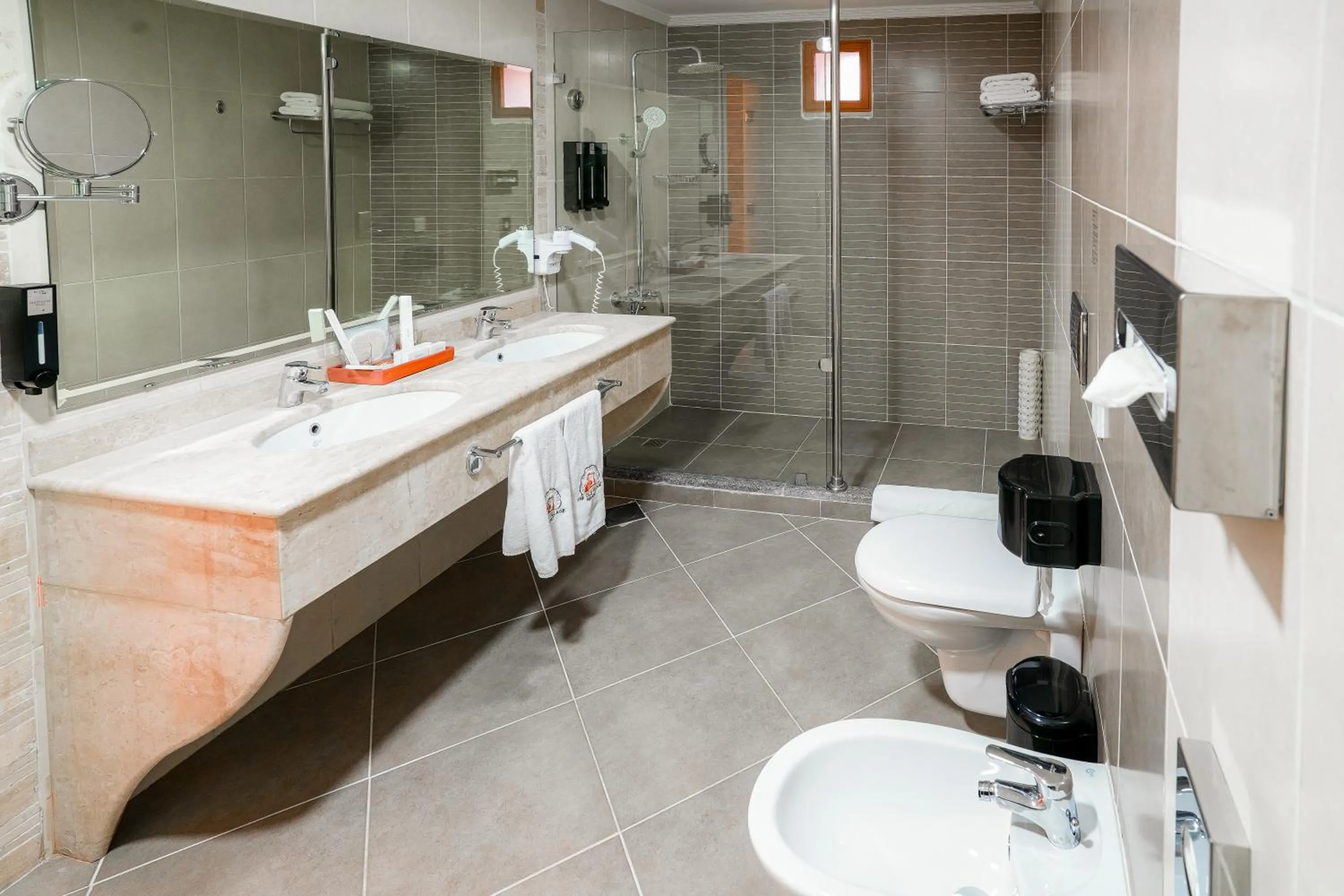 Shower in The Old Village Hotel & Resort