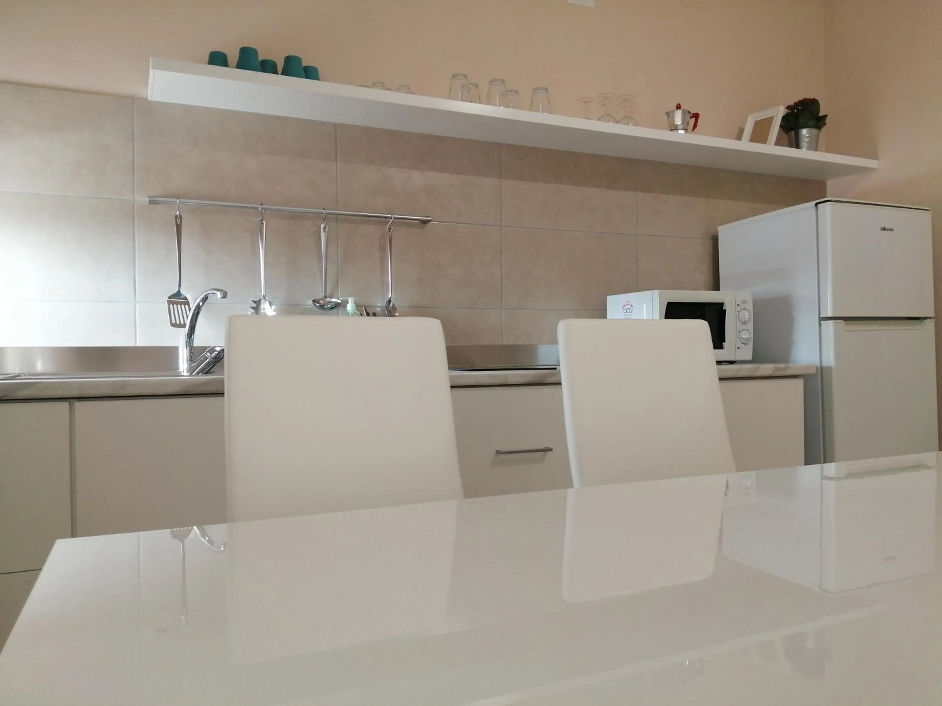 Kitchen or kitchenette in Villa Laura Residence Hotel Apartments & Studios