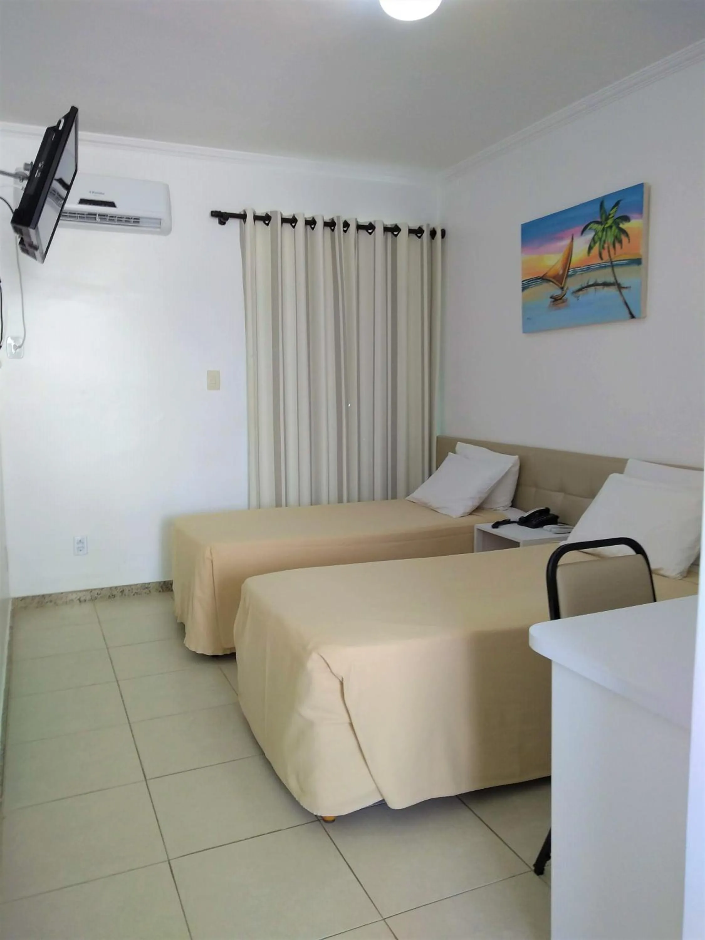 Photo of the whole room, Bed in Simas Praia Hotel