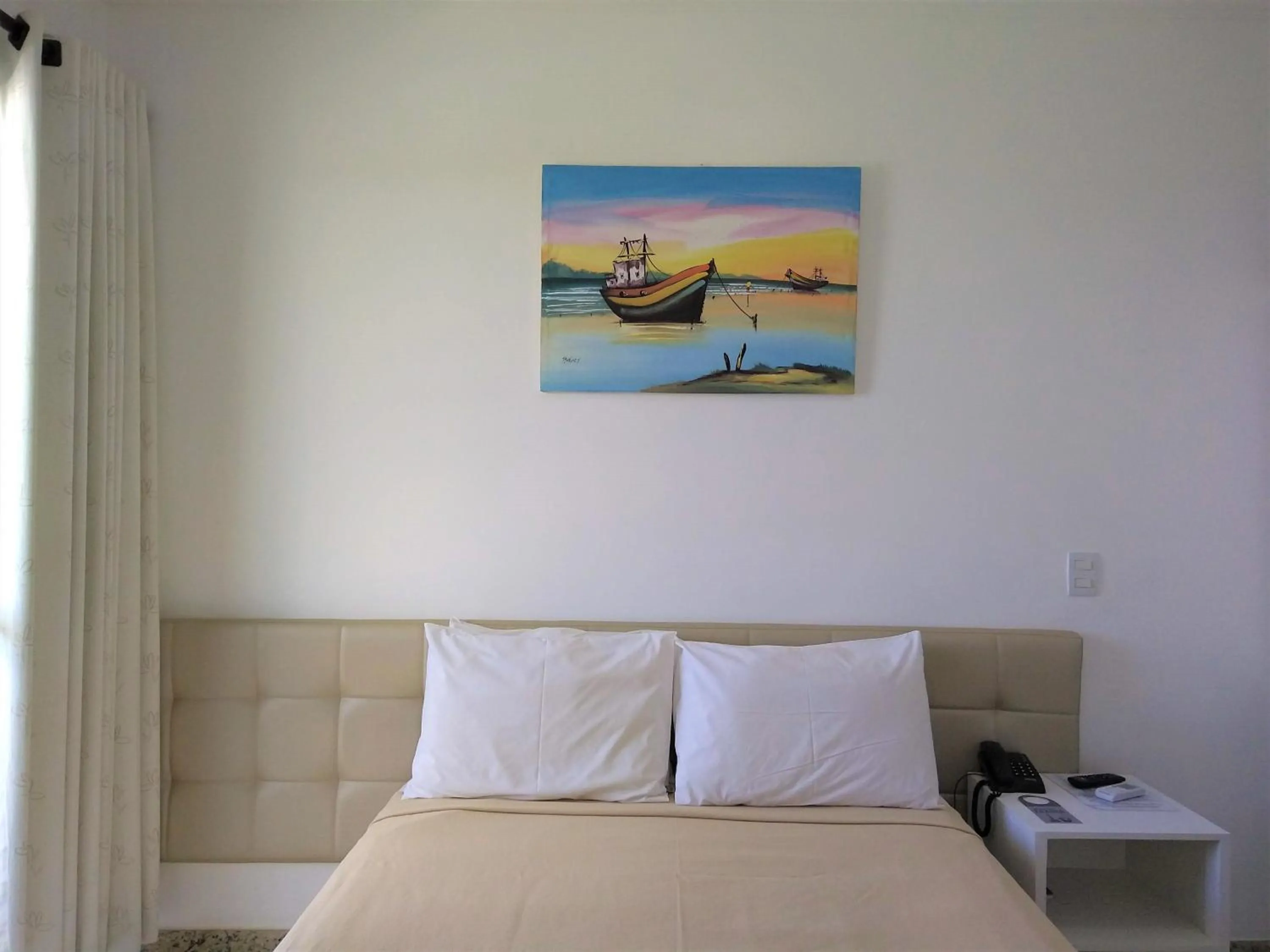 Photo of the whole room, Bed in Simas Praia Hotel