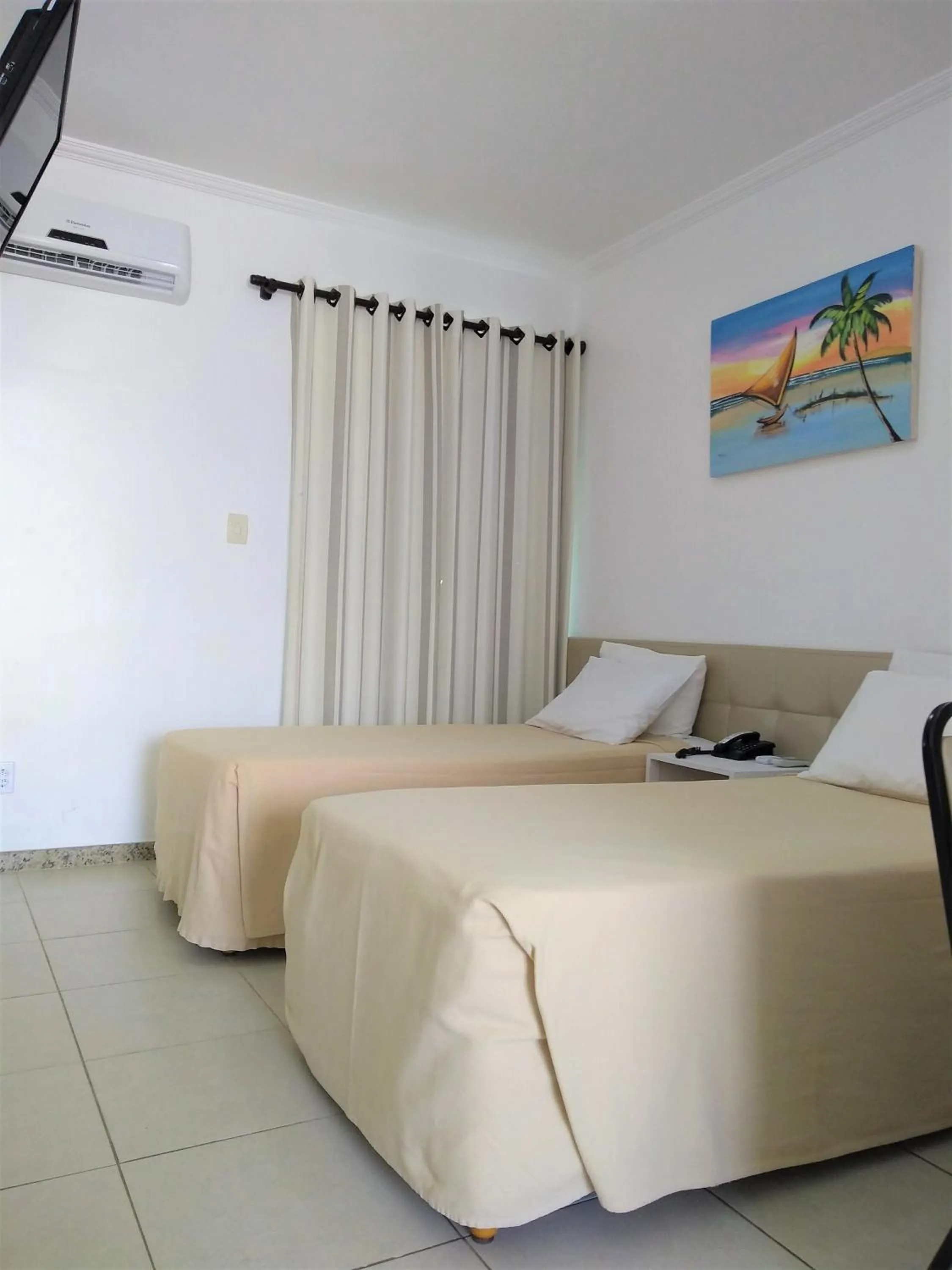 Photo of the whole room, Bed in Simas Praia Hotel