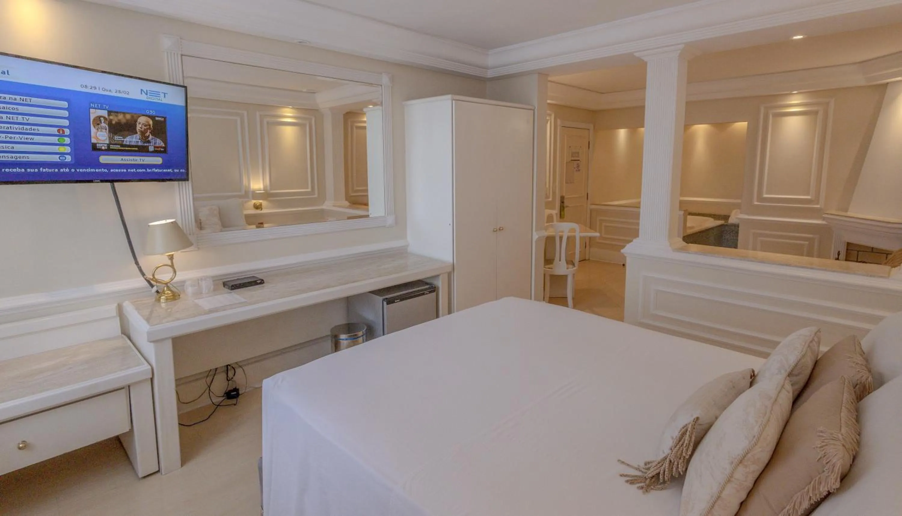 Bed in Lizon Curitiba Hotel