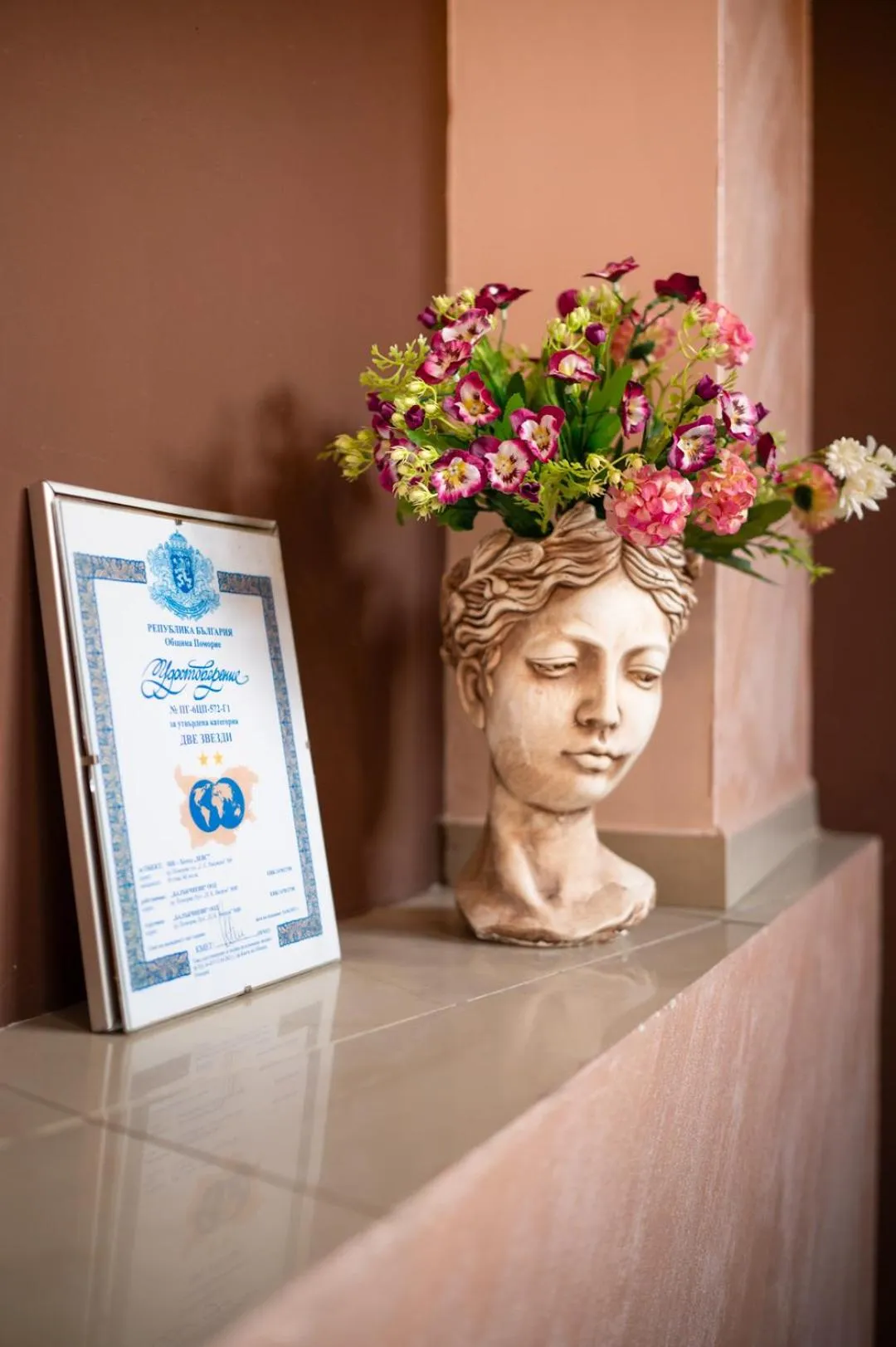 Property logo or sign in Hotel Zeus