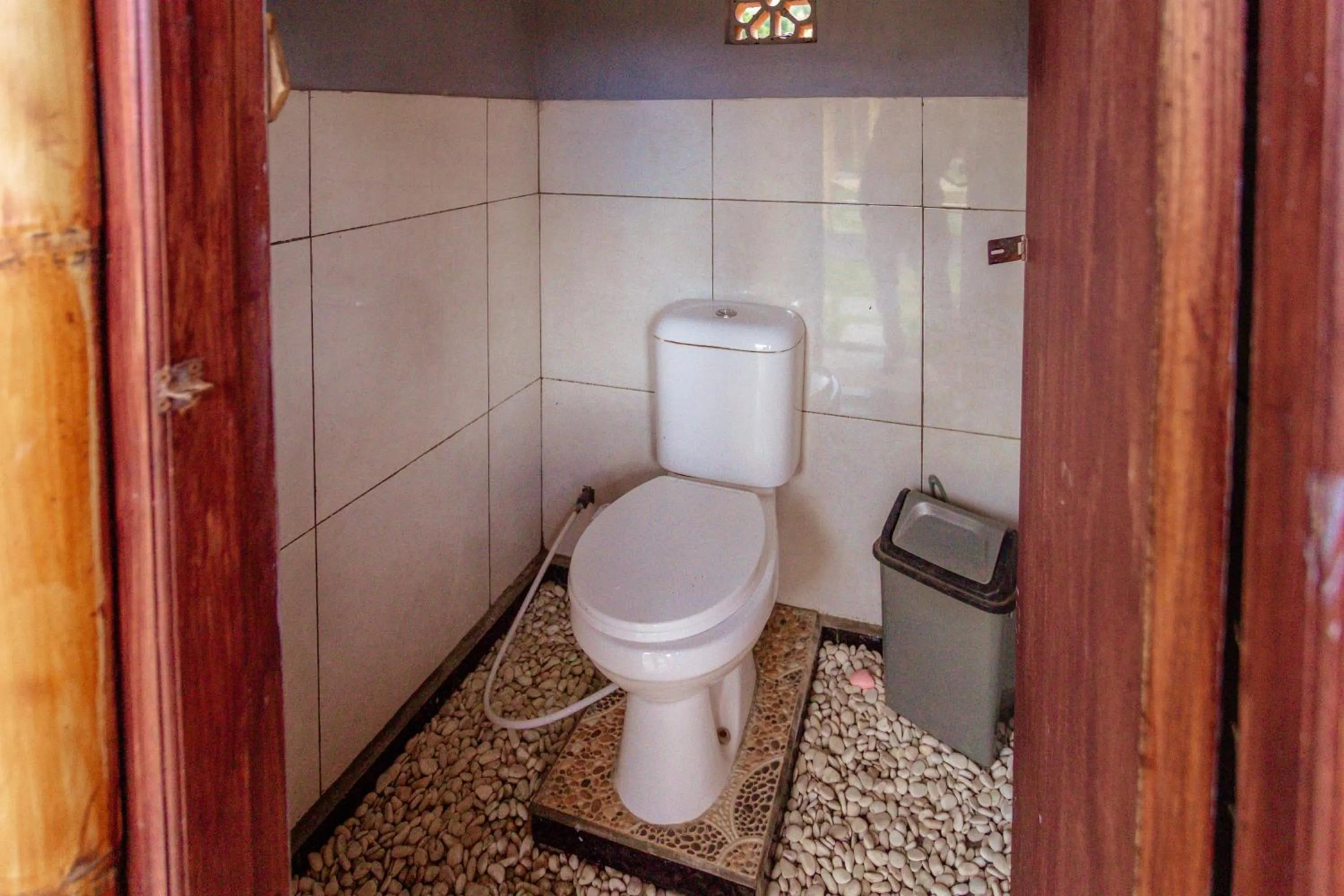 Bathroom in Batur Bamboo Cabin by ecommerceloka