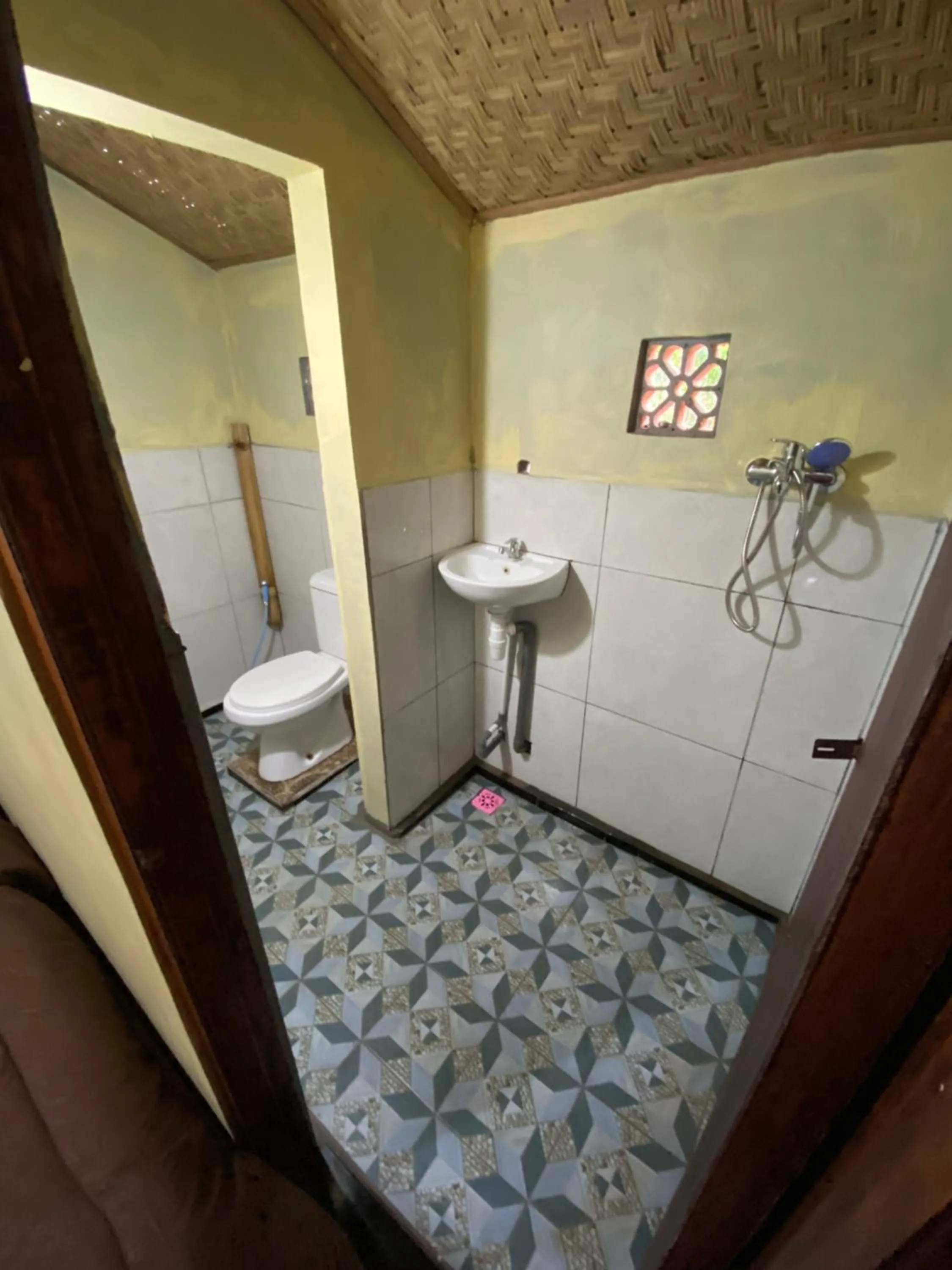 Bathroom in Batur Bamboo Cabin by ecommerceloka