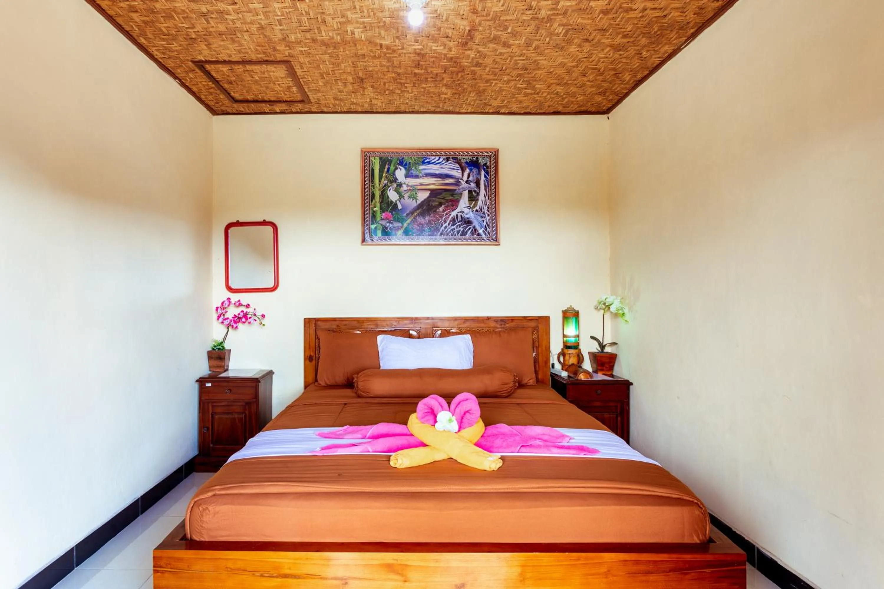 Bed in Batur Bamboo Cabin by ecommerceloka