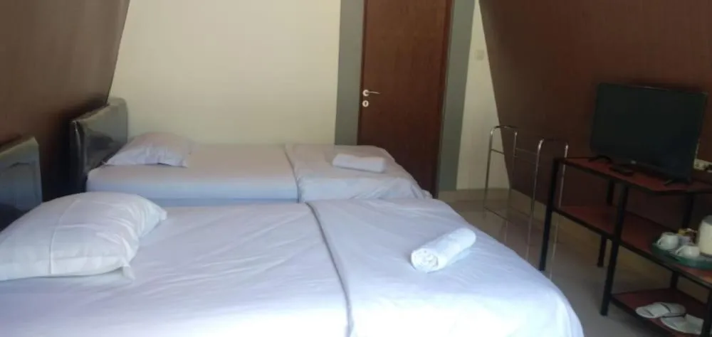 Bed in Bromo Camp House