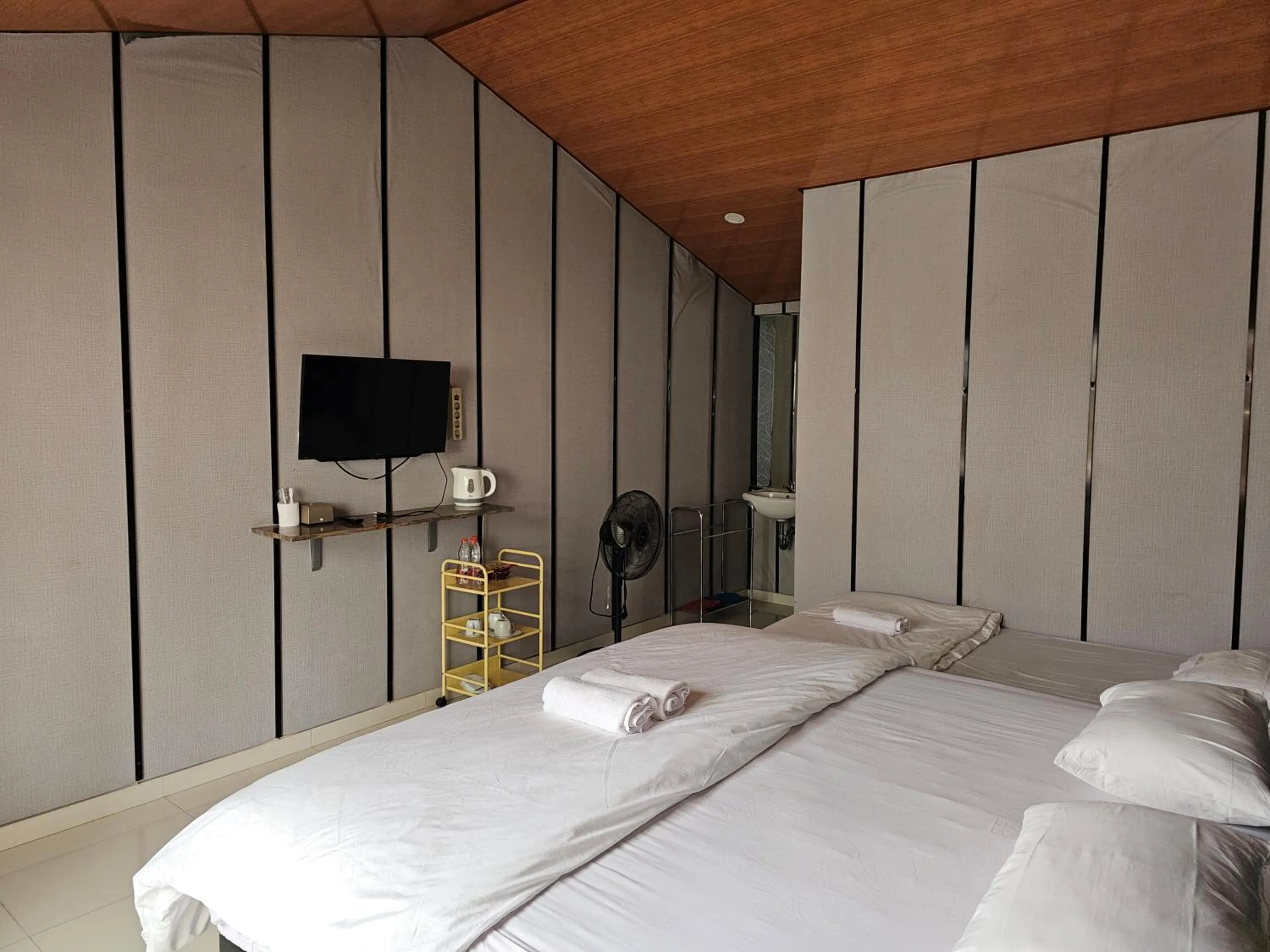 Bed in Bromo Camp House