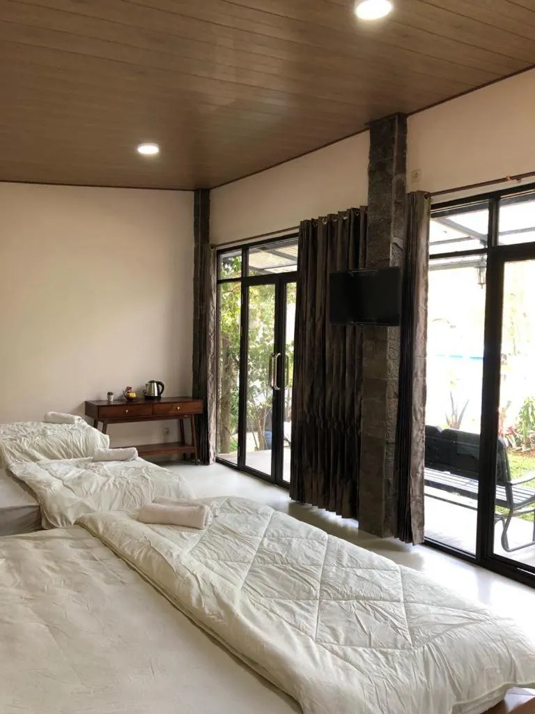 Bed in Bromo Camp House