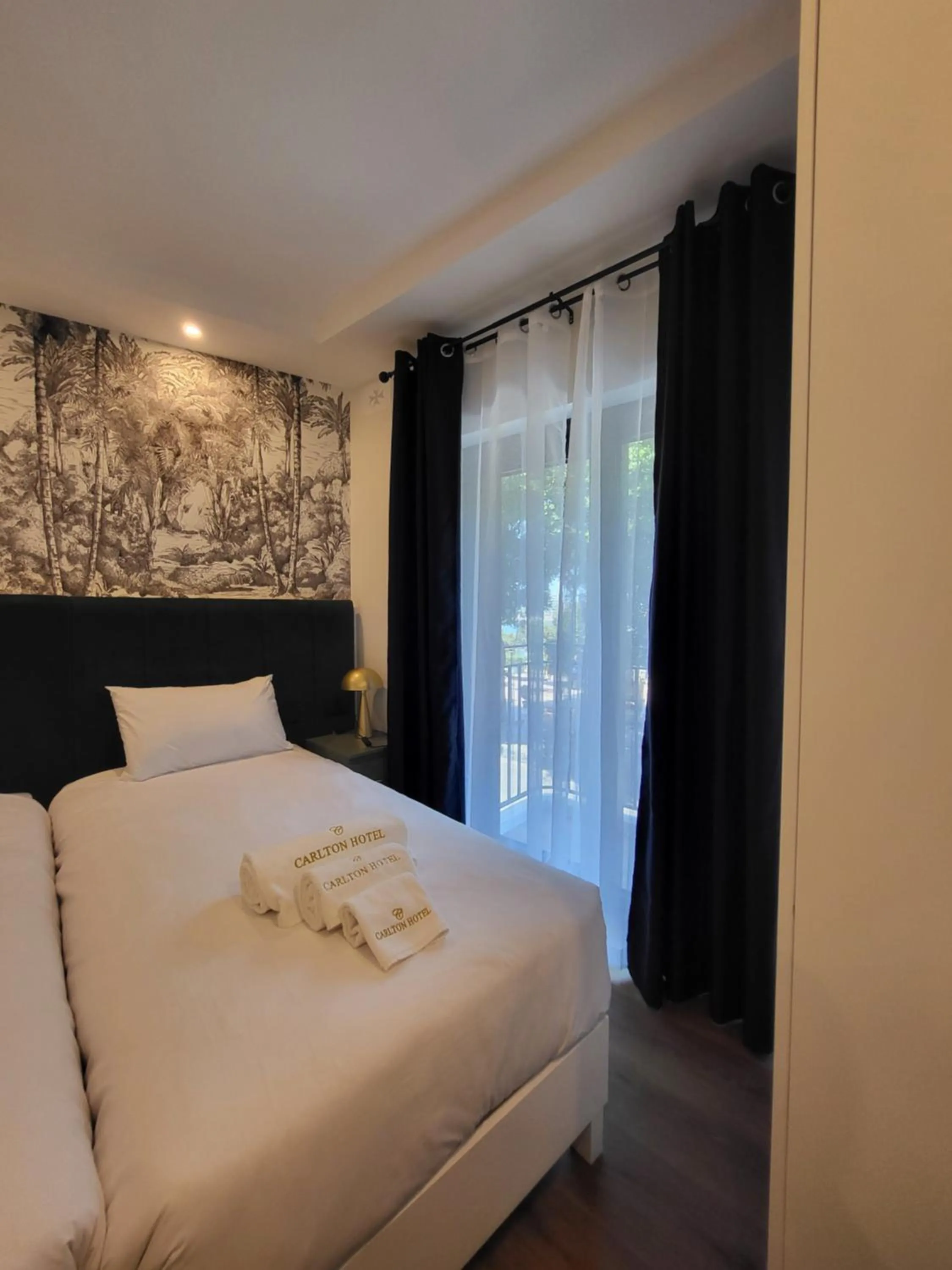 Bed in Carlton Hotel