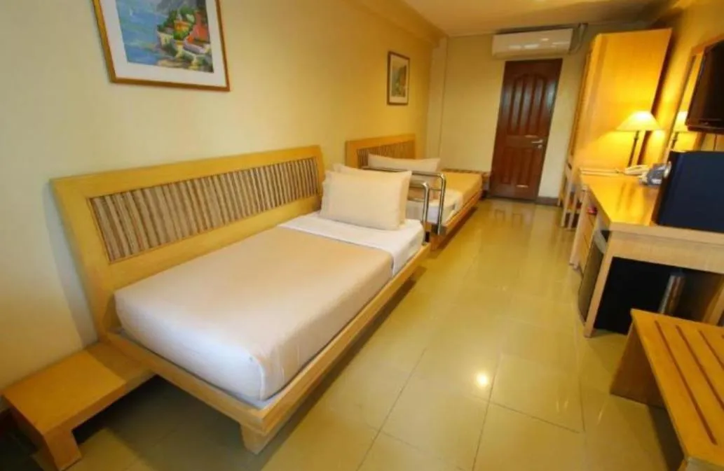 Bed in Trace Suites by SMS Hospitality