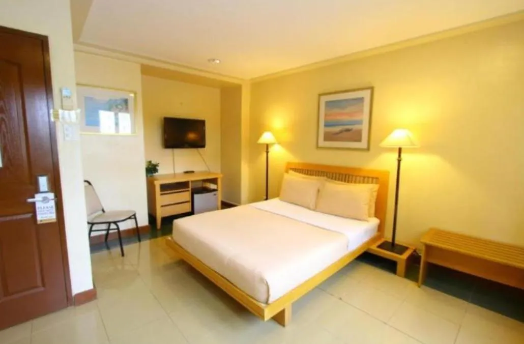 Bed in Trace Suites by SMS Hospitality