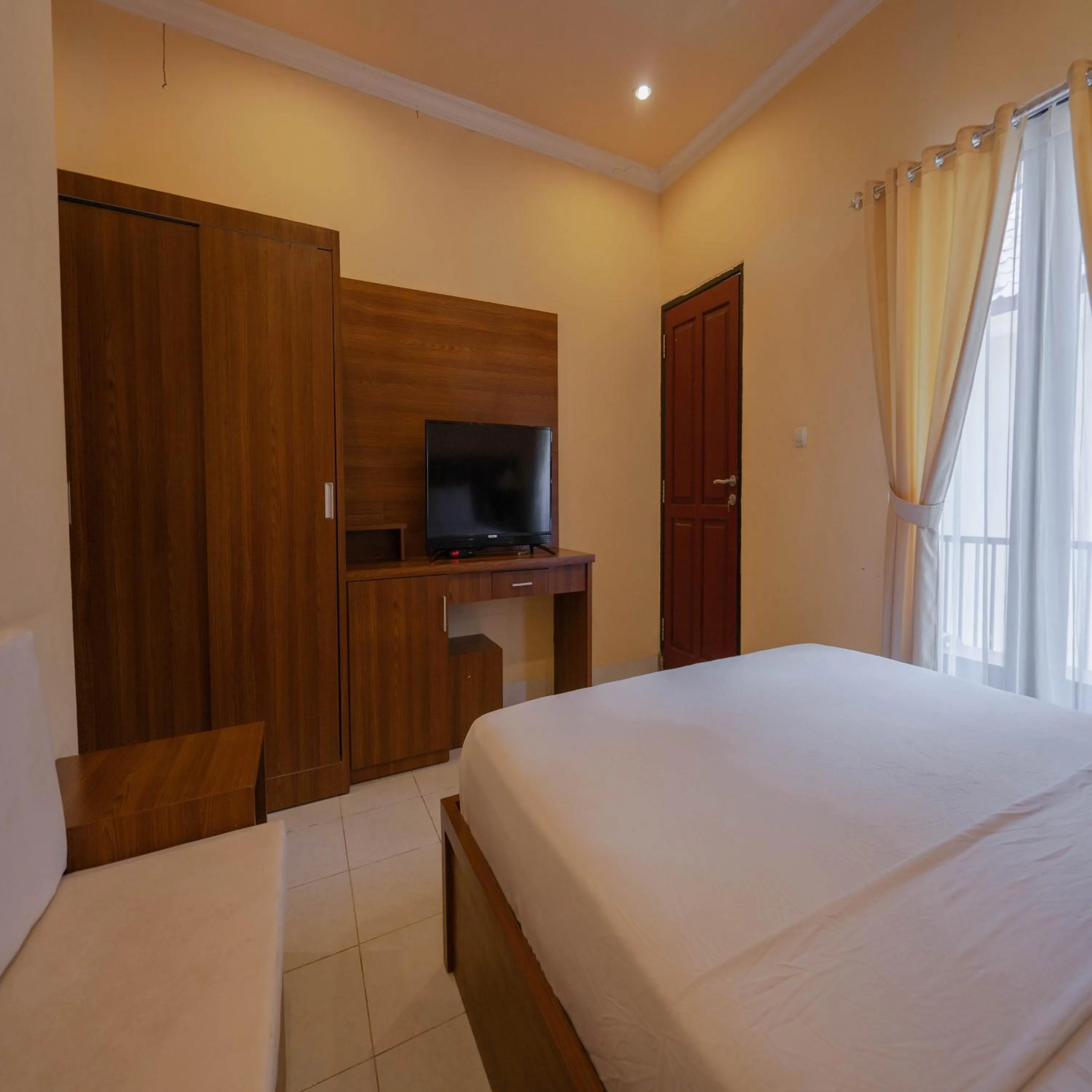 TV and multimedia, Bed in Urbanview My Home One Gili Trawangan