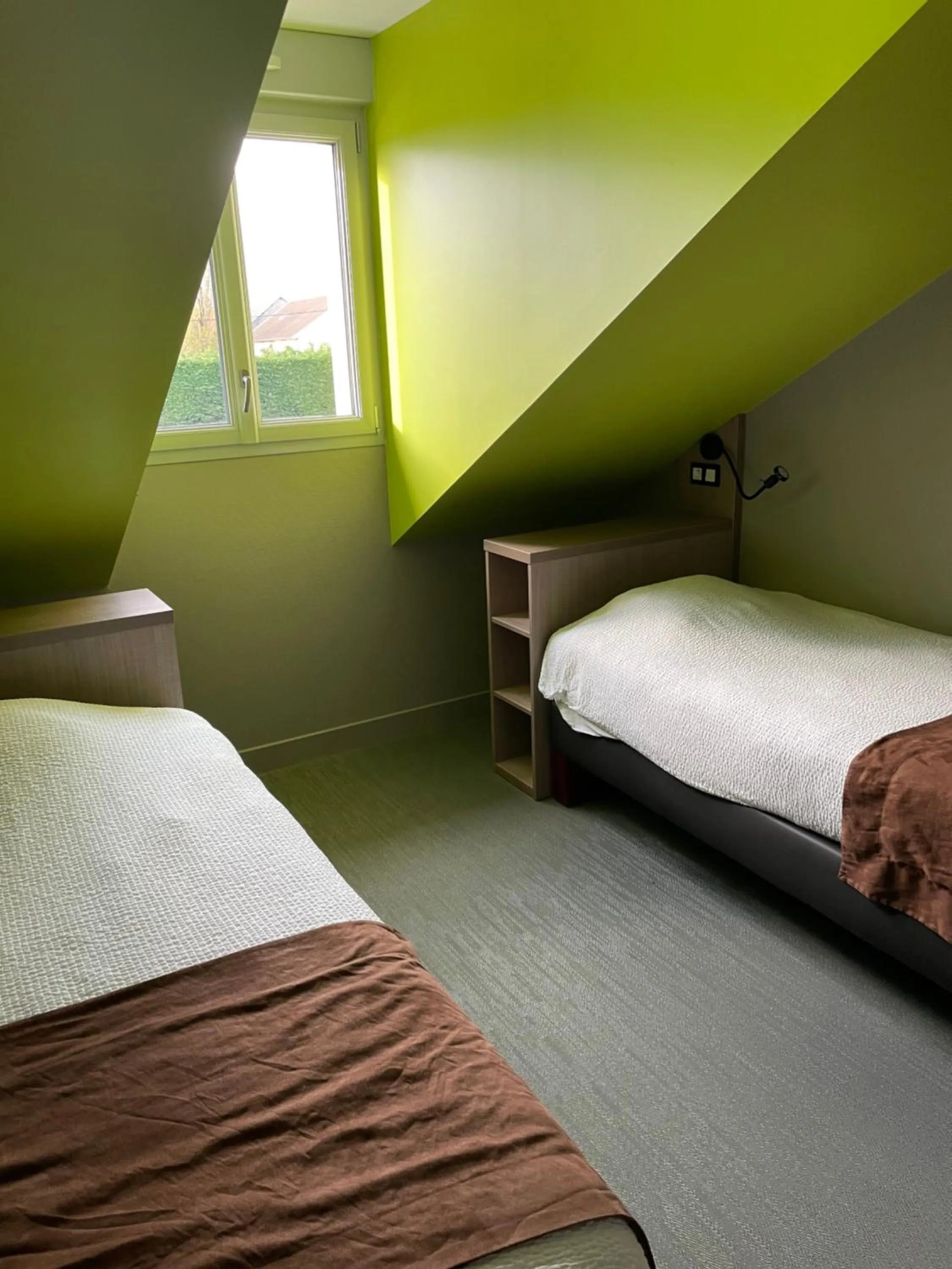 Bed in Logis Jum'Hotel
