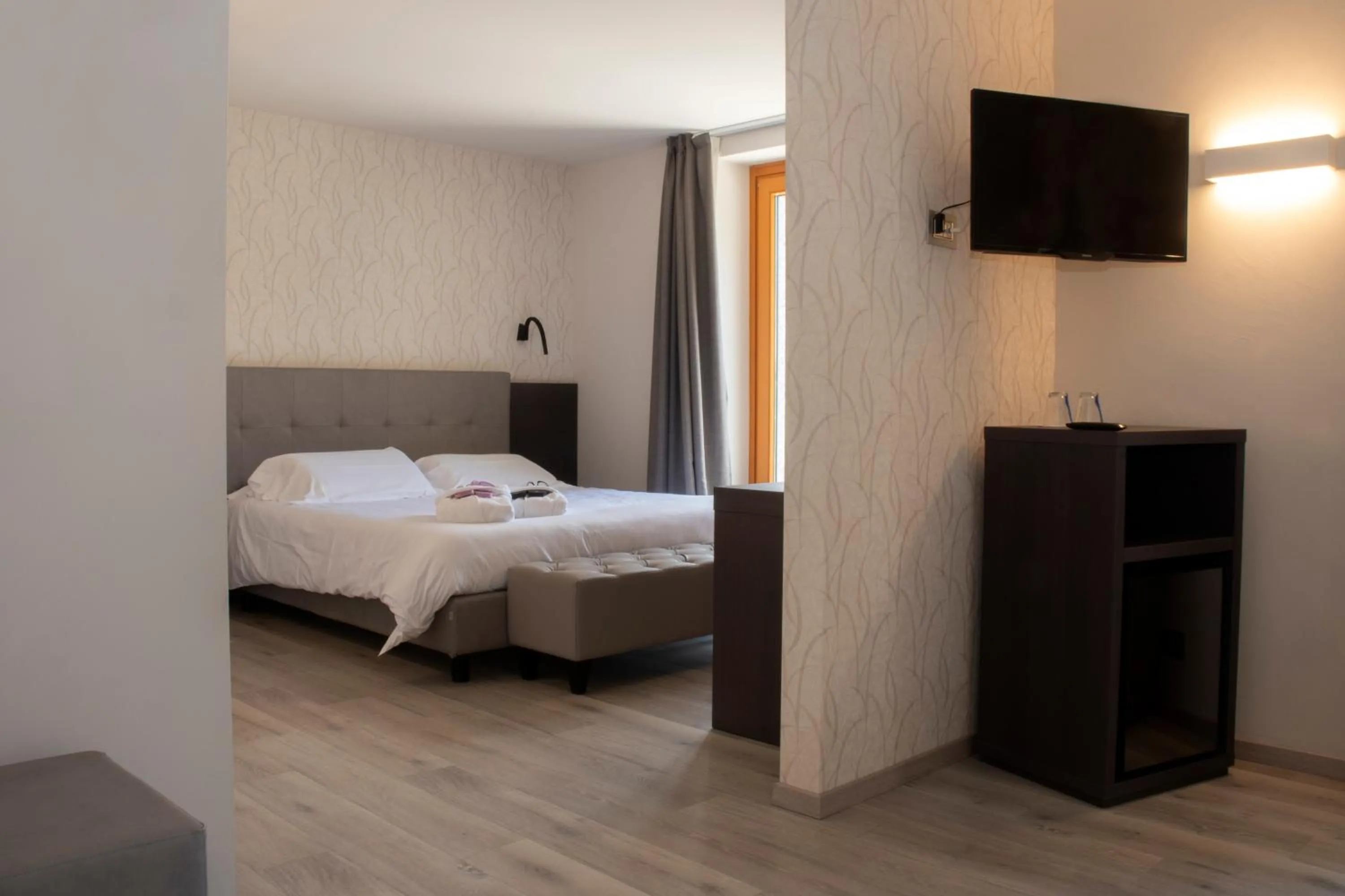 Bedroom in Hotel Belvedere Wellness&SPA