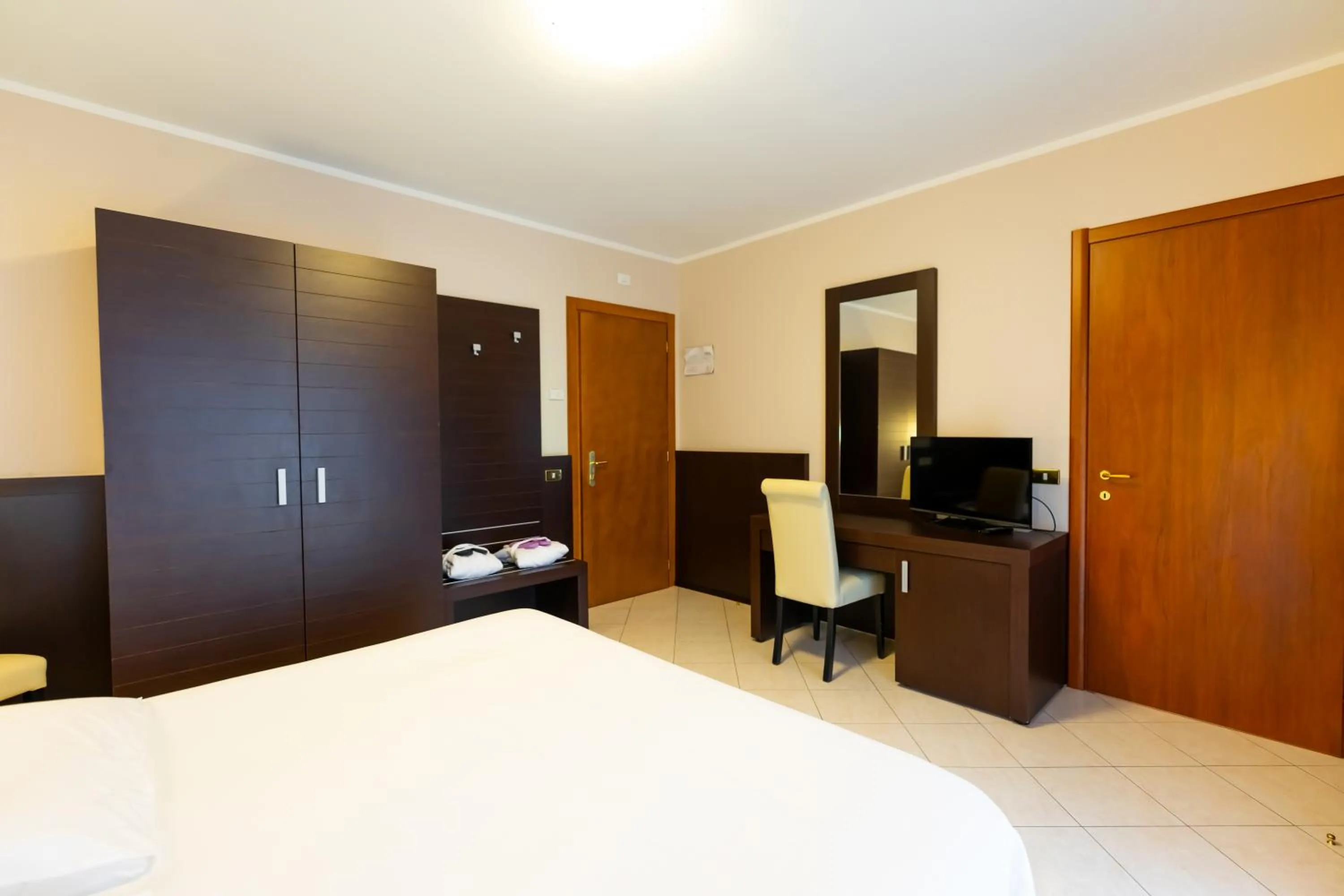 Bed in Hotel Belvedere Wellness&SPA