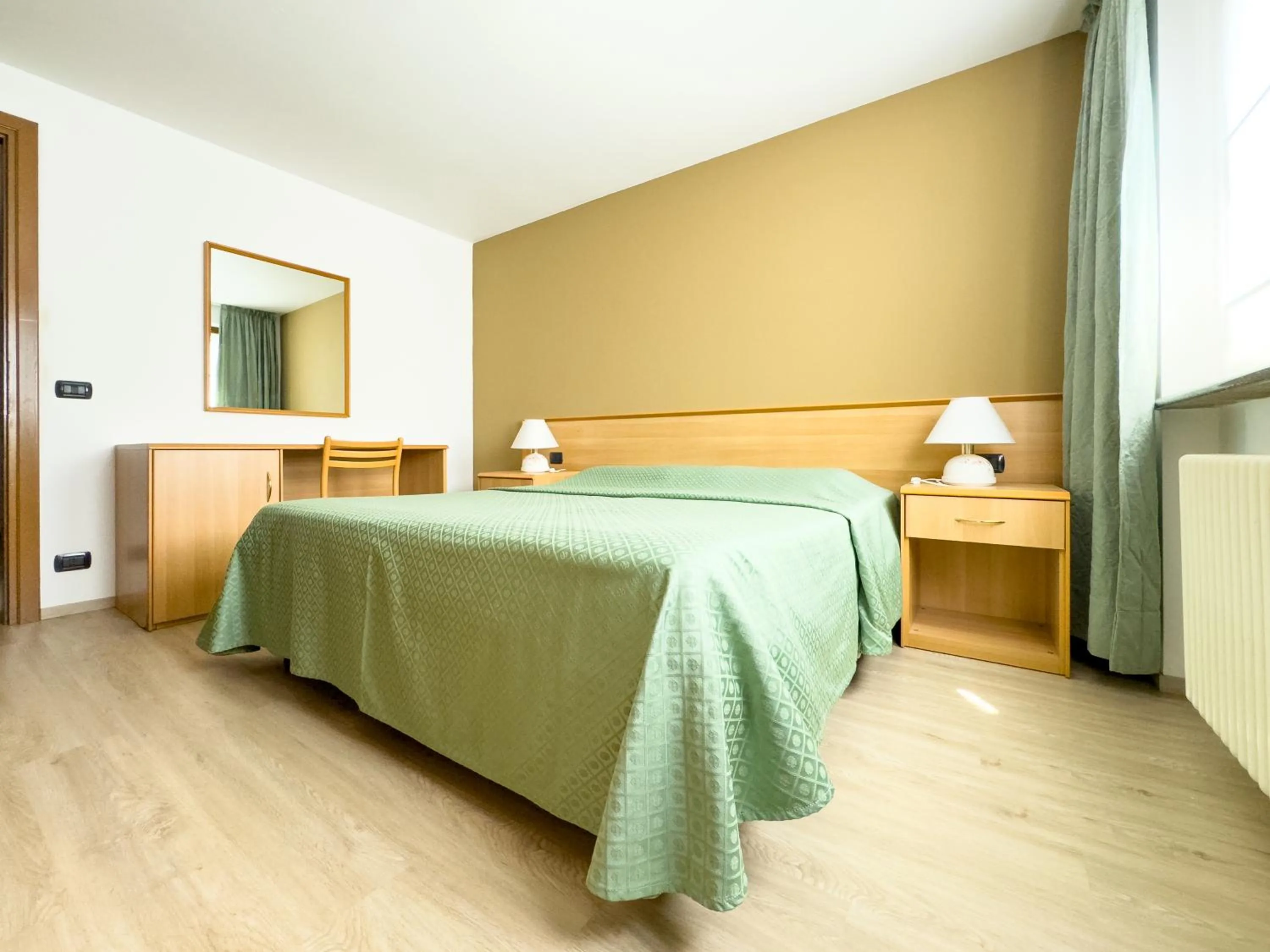 Bed in Hotel Belvedere Wellness&SPA