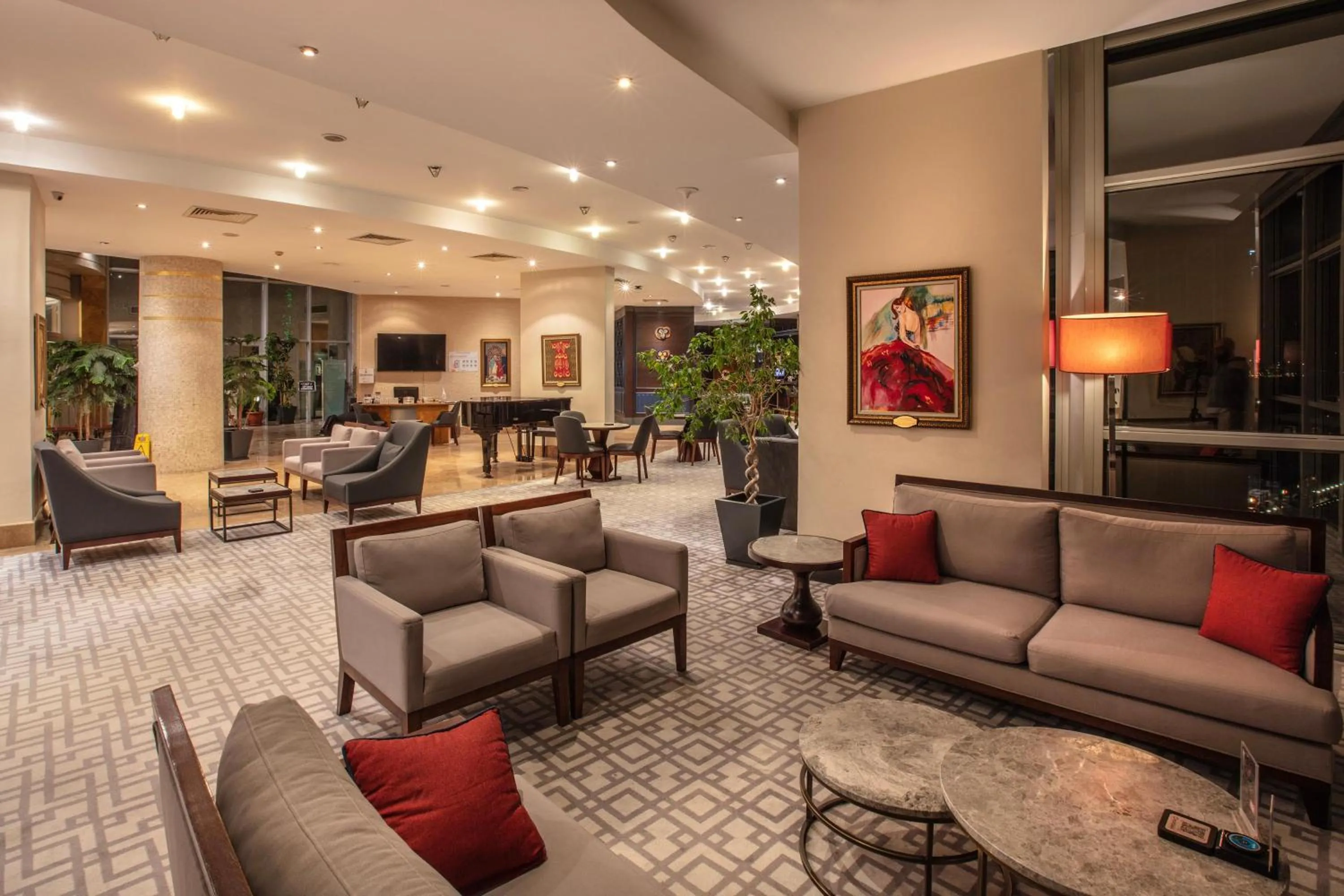 Lobby or reception in Charisma De Luxe Hotel