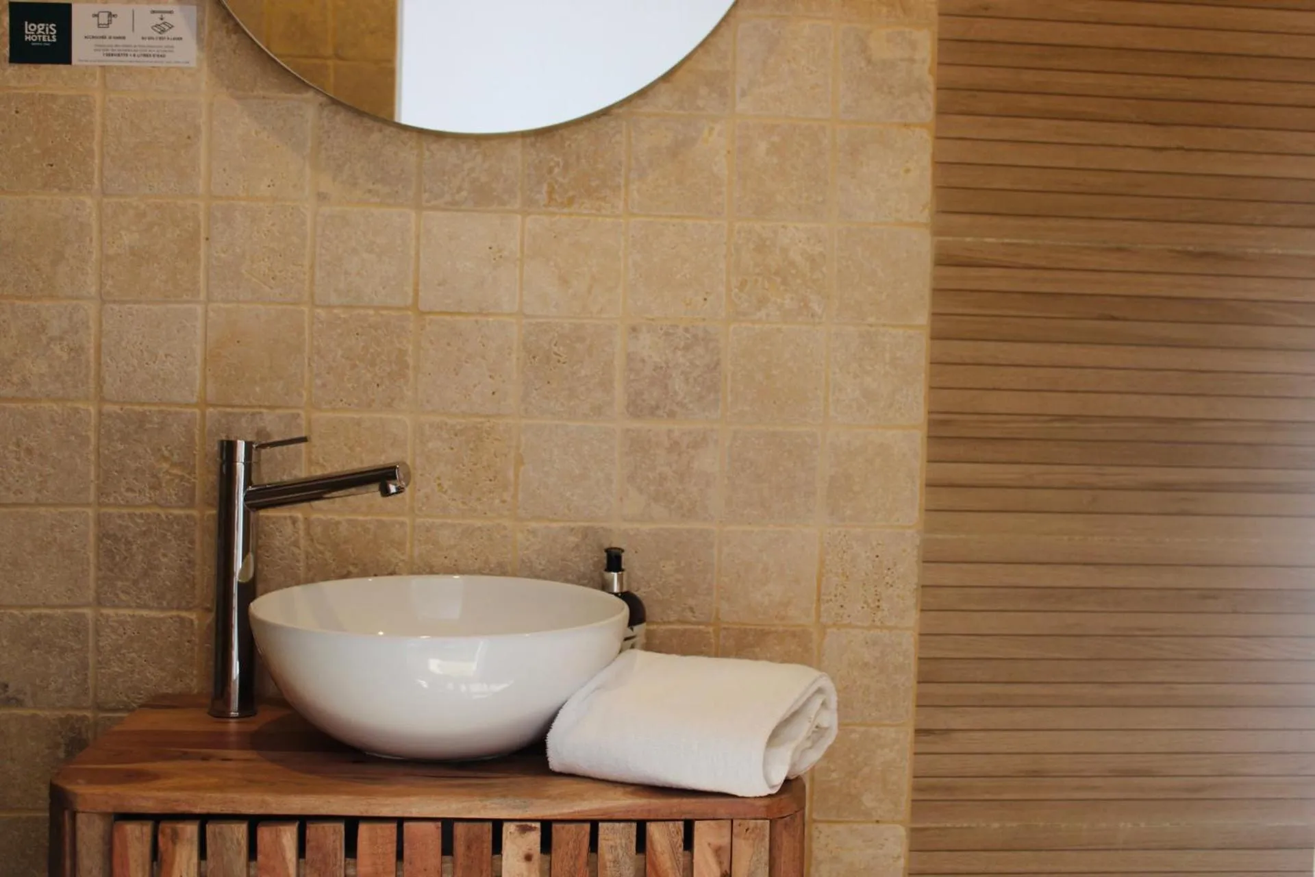 Bathroom in Logis Hôtel L'Ayguelade