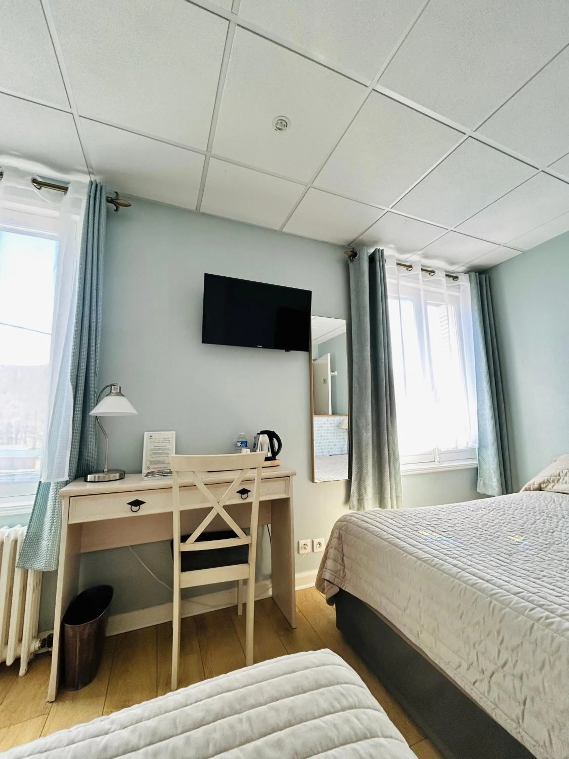 Bed in Logis Hôtel L'Ayguelade