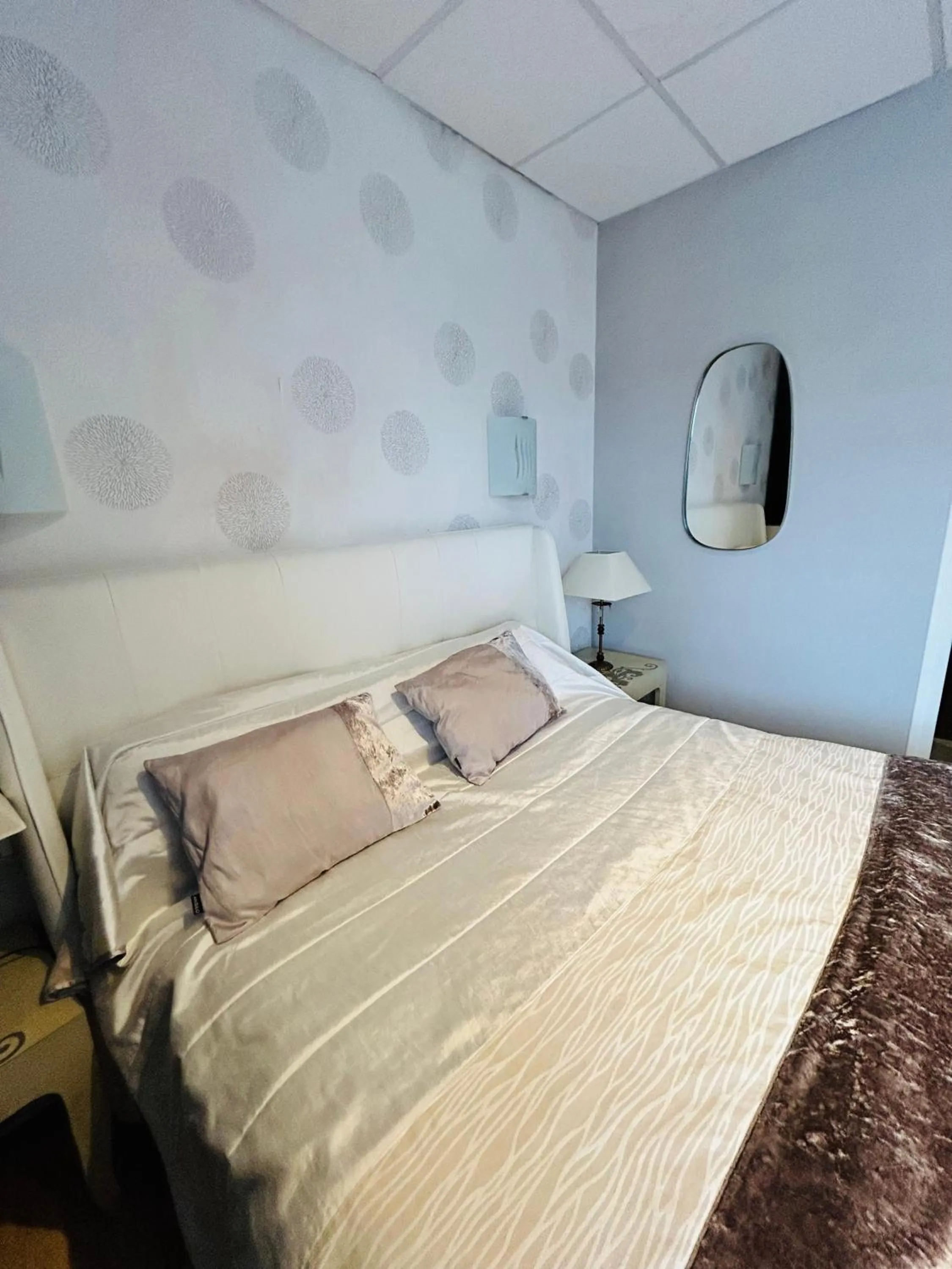 Bed in Logis Hôtel L'Ayguelade