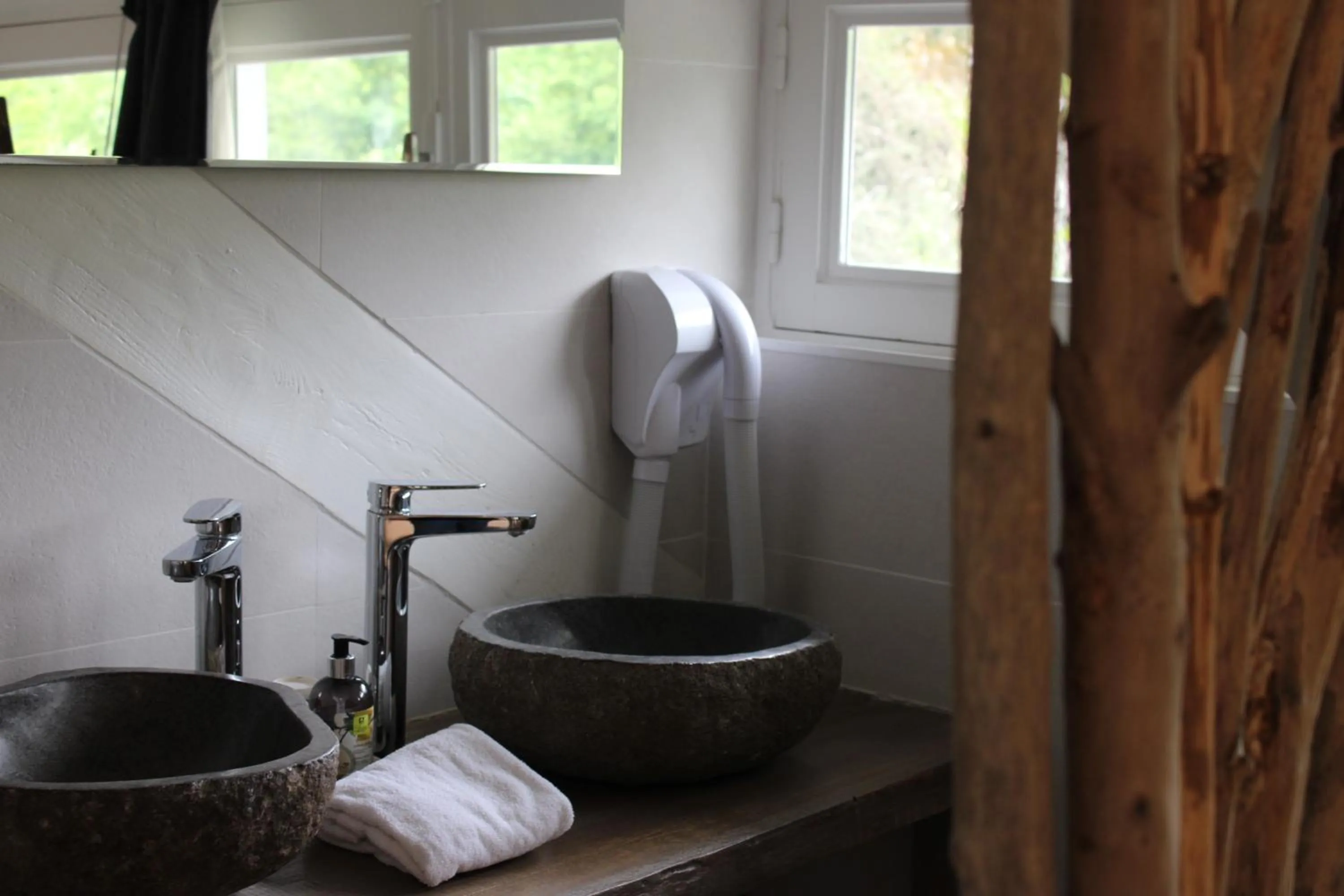 Bathroom in Logis Hôtel L'Ayguelade