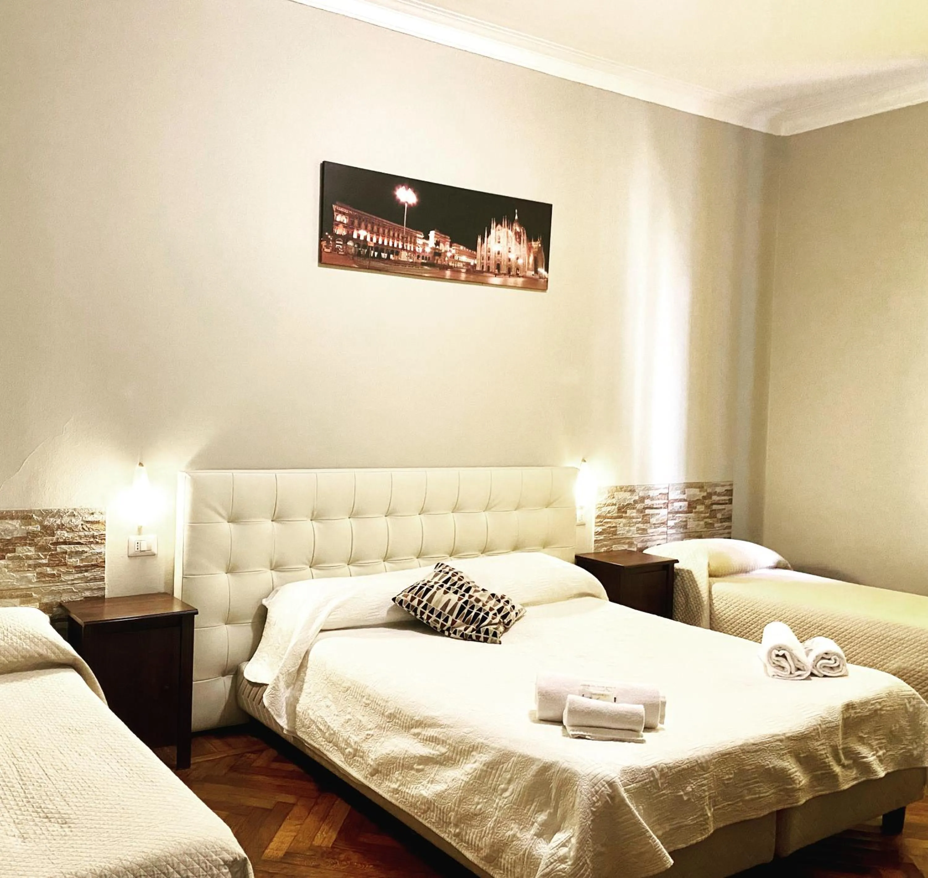 Bed in Carlo Goldoni Hotel