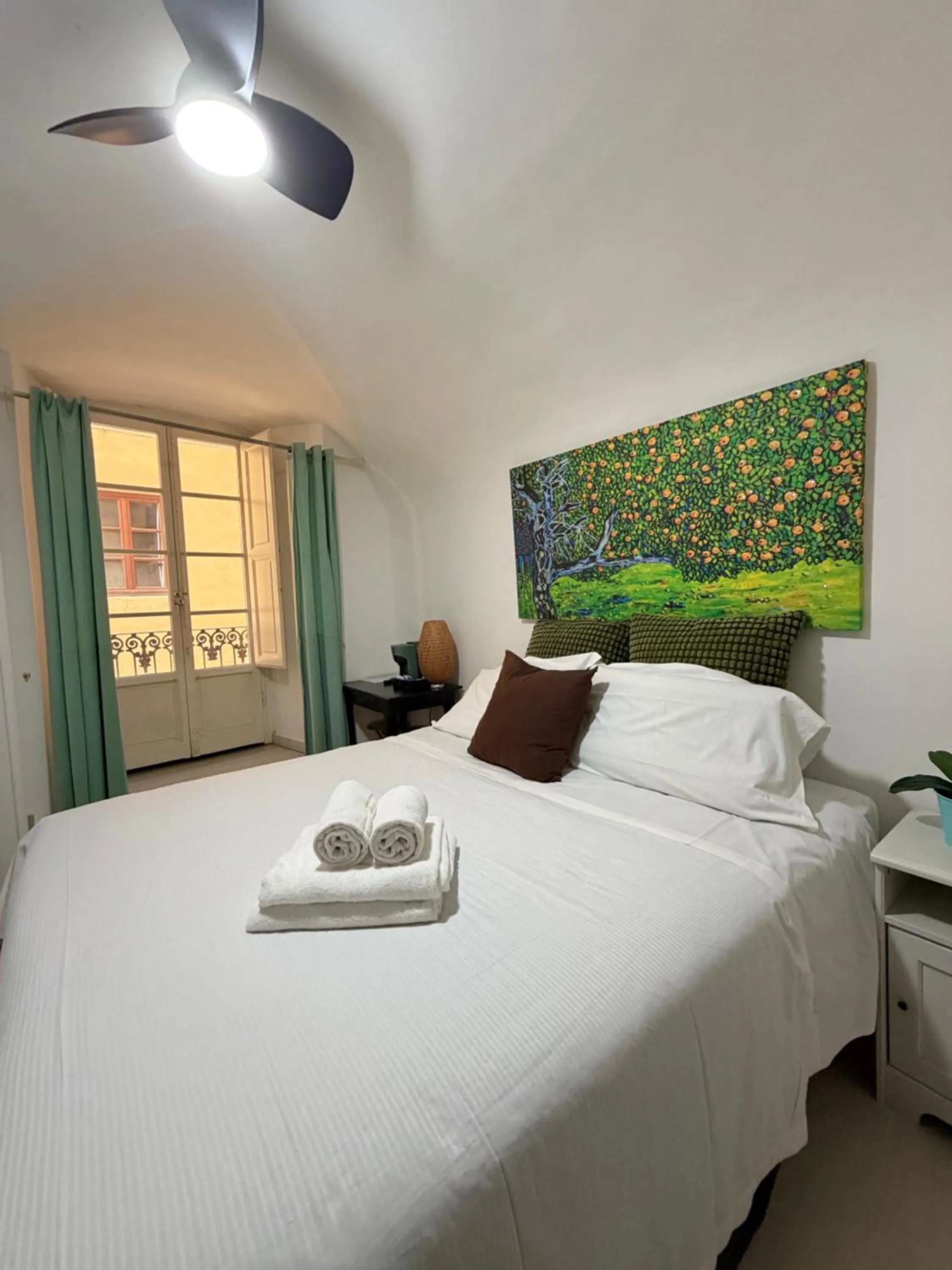 Bed in Gattopardo Rooms Florence