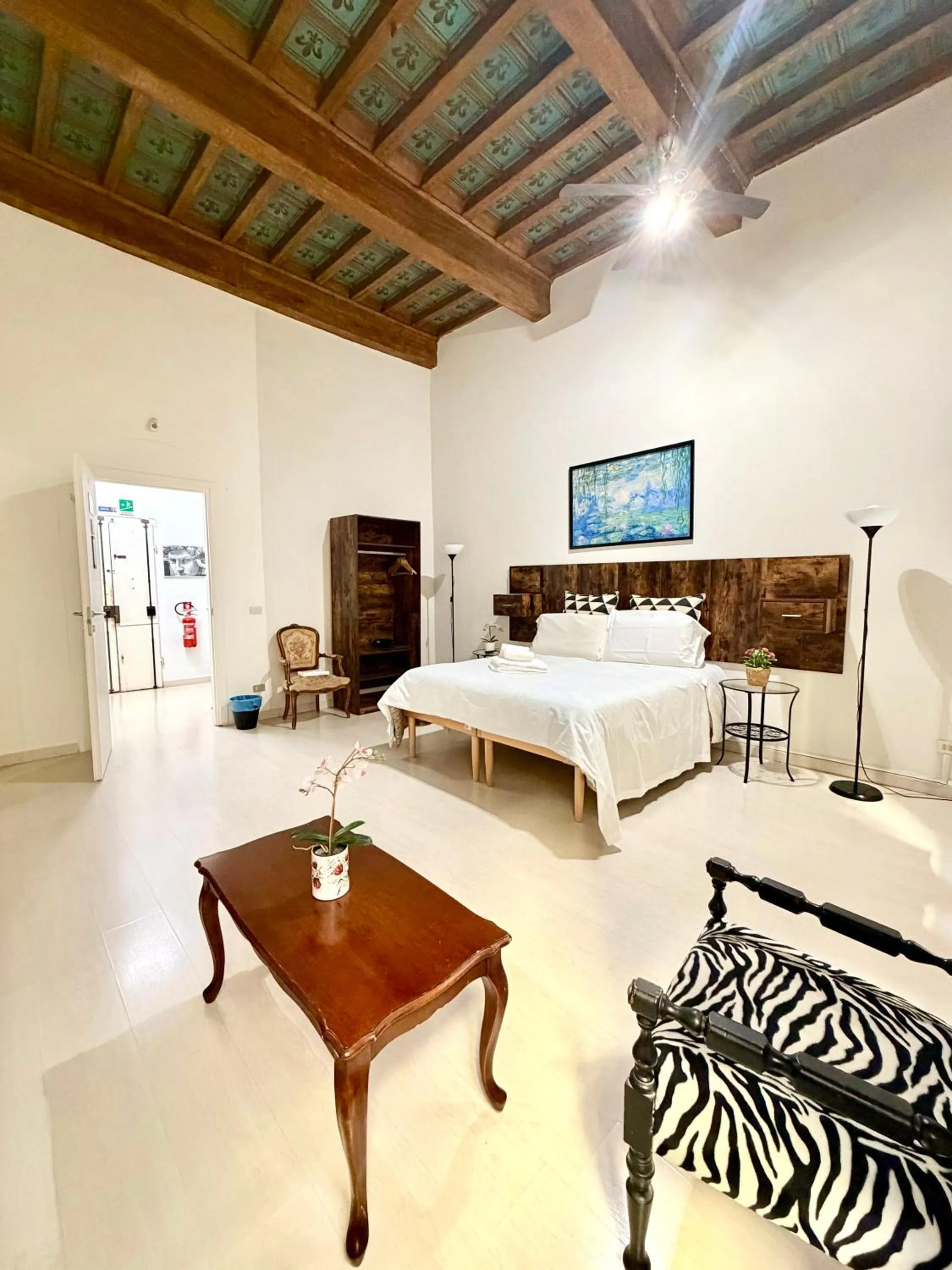 Living room, Bed in Gattopardo Rooms Florence