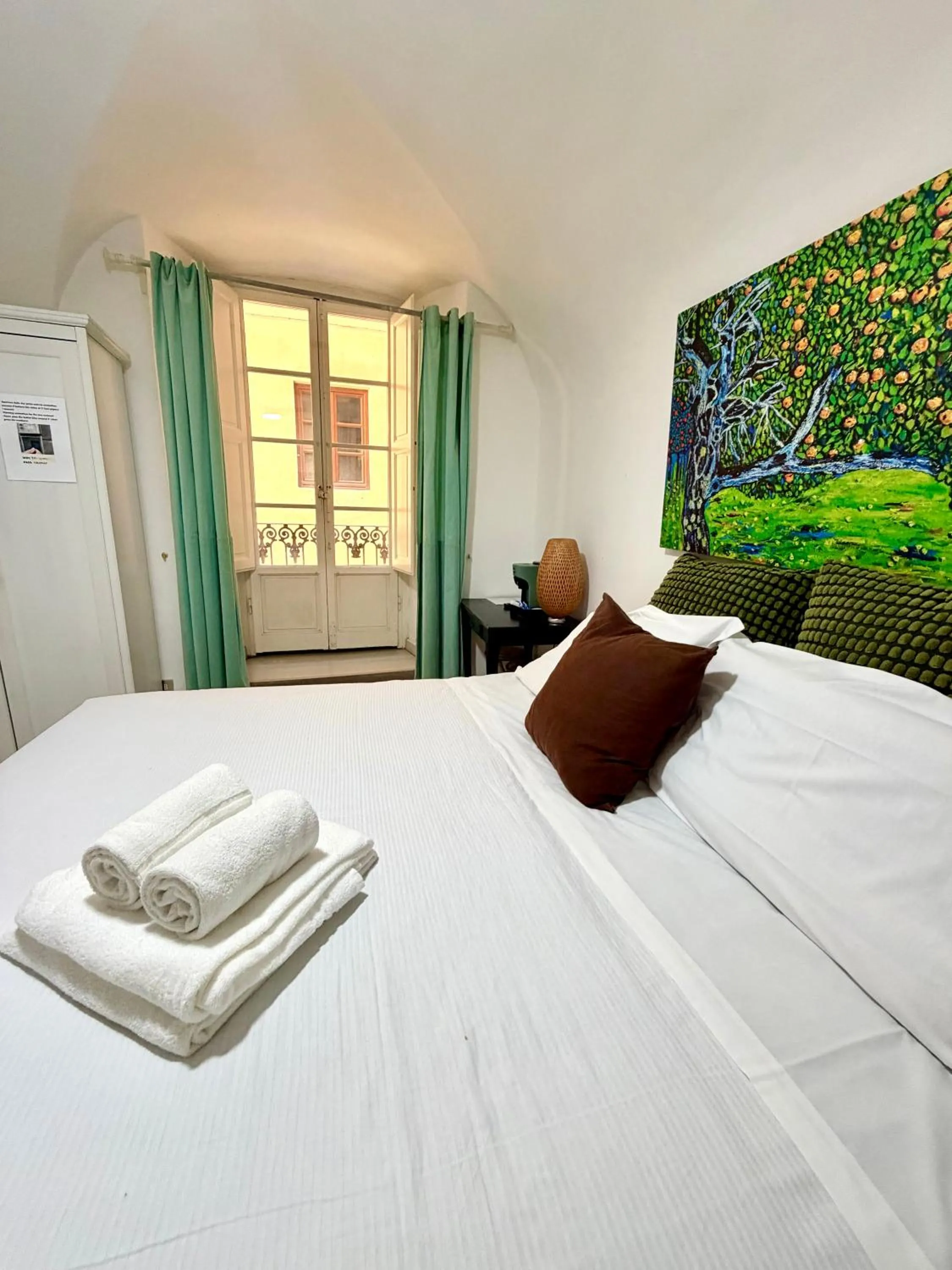 Photo of the whole room, Bed in Gattopardo Rooms Florence
