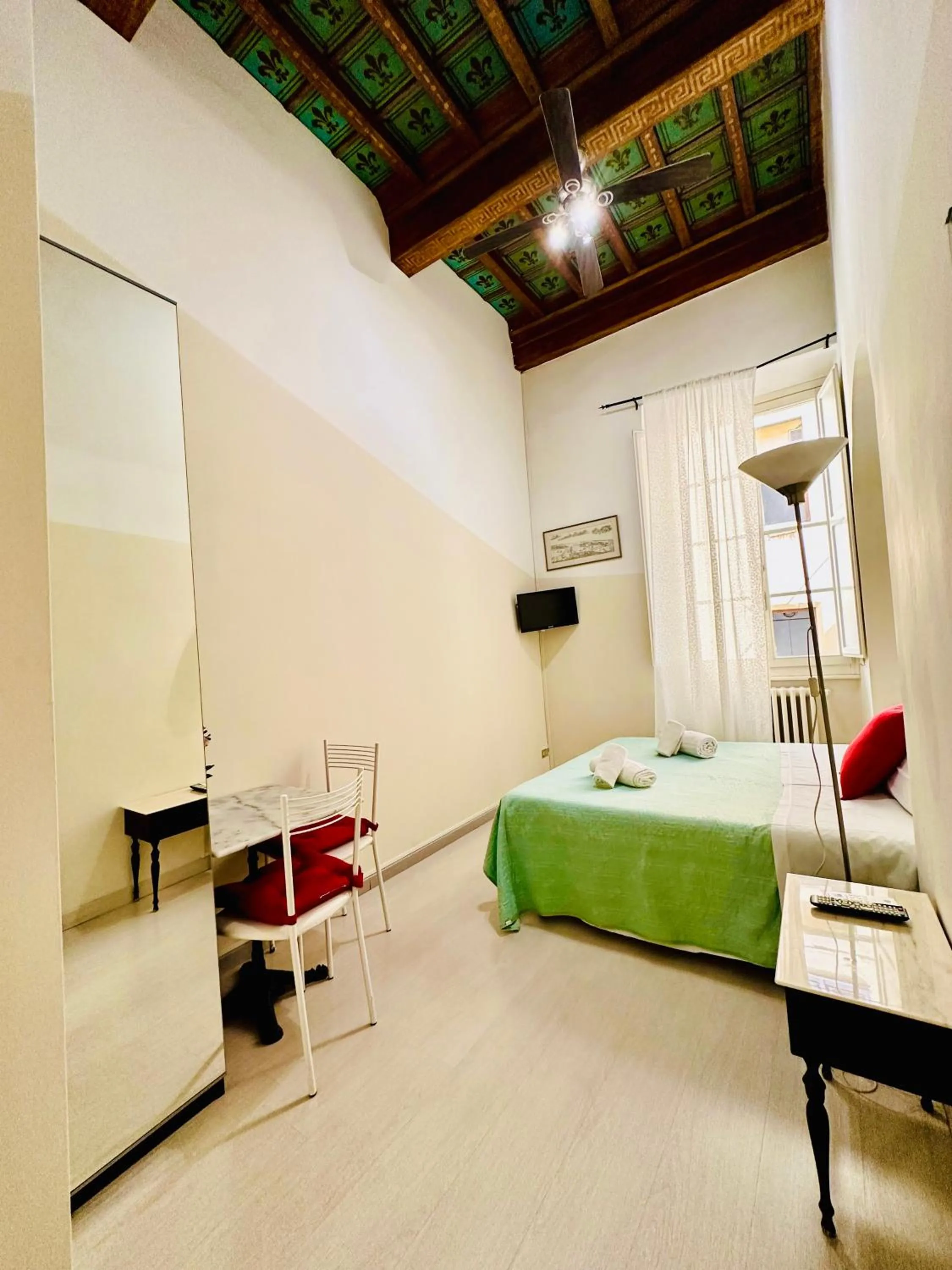 Bedroom, Bed in Gattopardo Rooms Florence