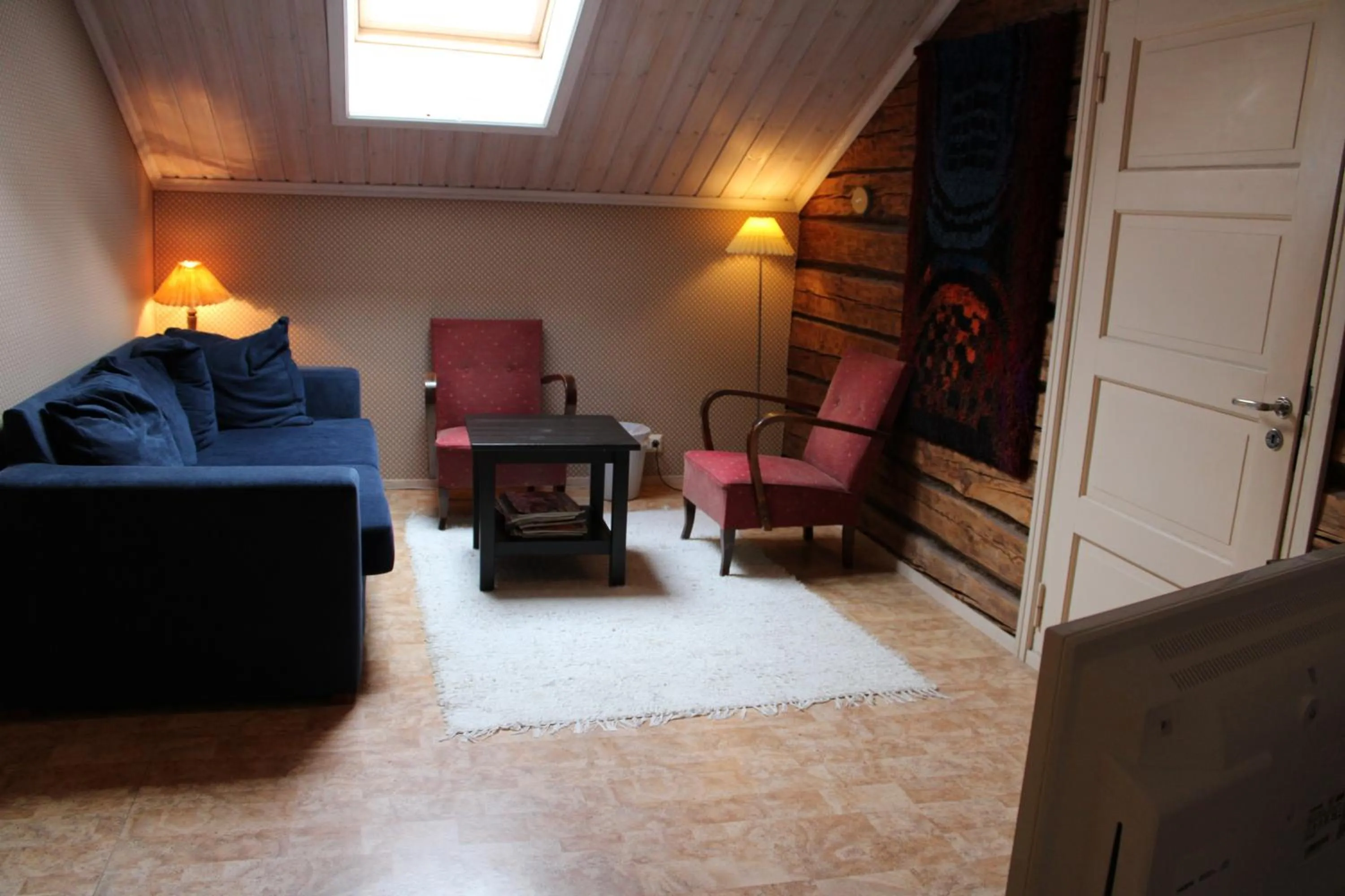 Communal lounge/ TV room in Hotel Stallbacken Nagu