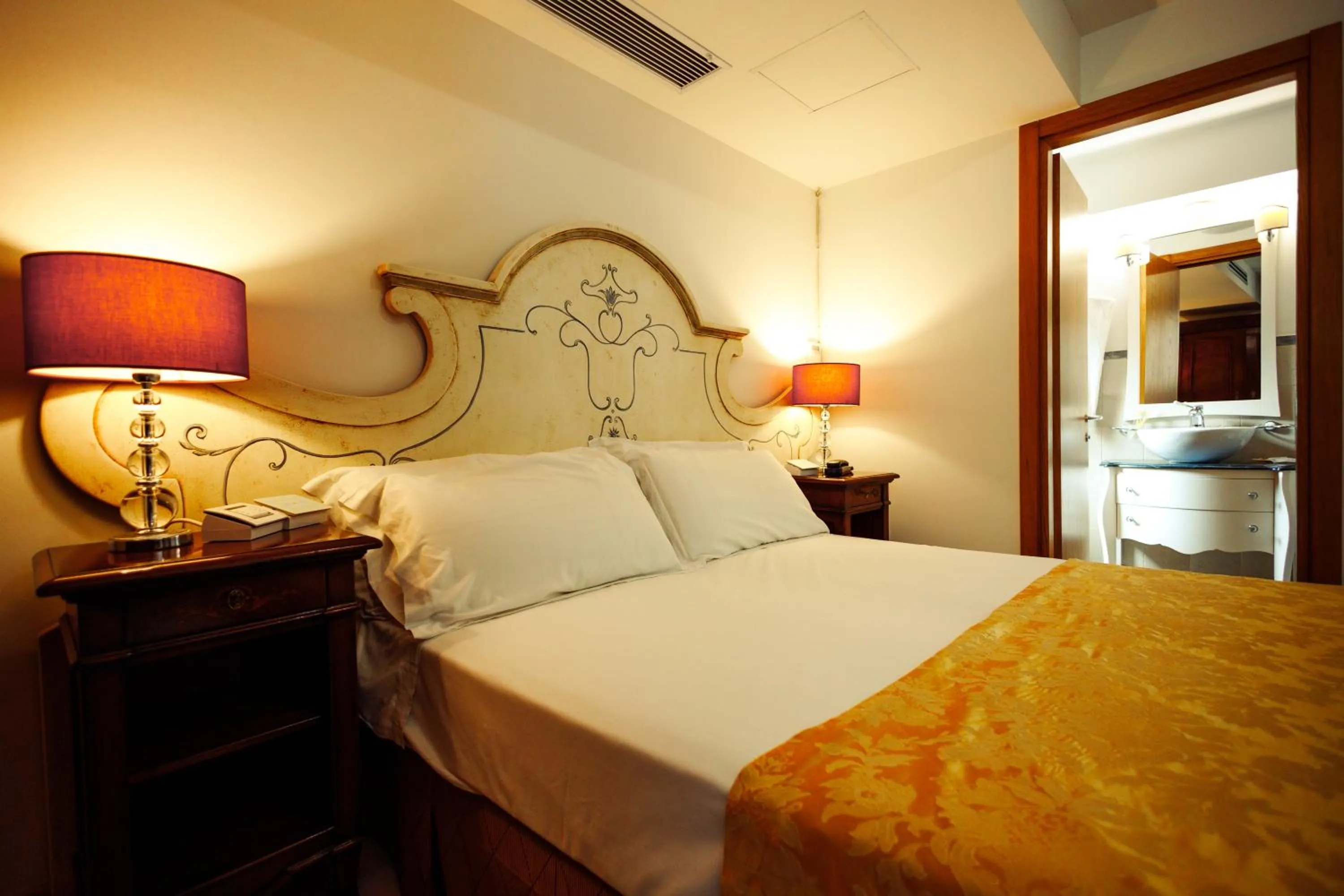 Bed in Vico Regio Hotel
