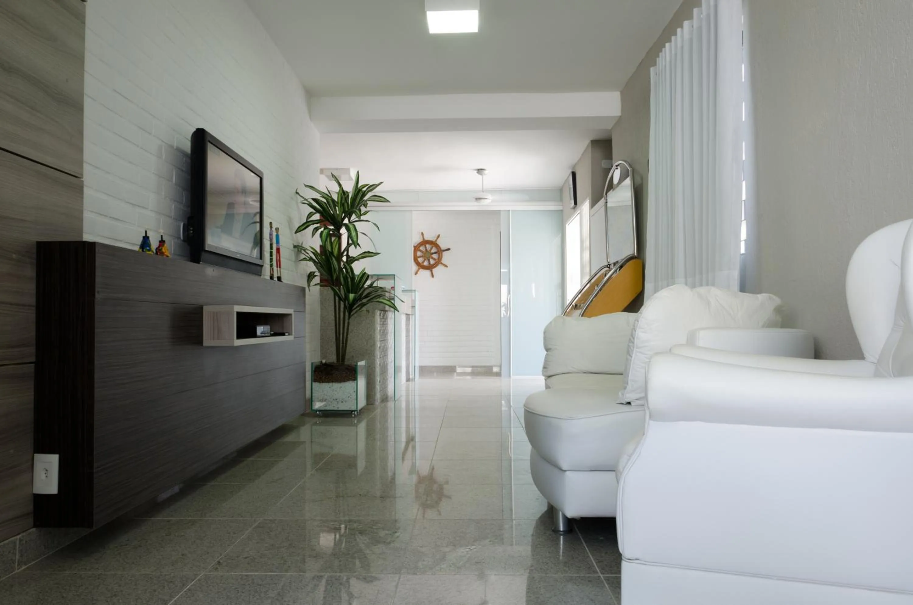 Communal lounge/ TV room in Hotel Pousada Da Sereia