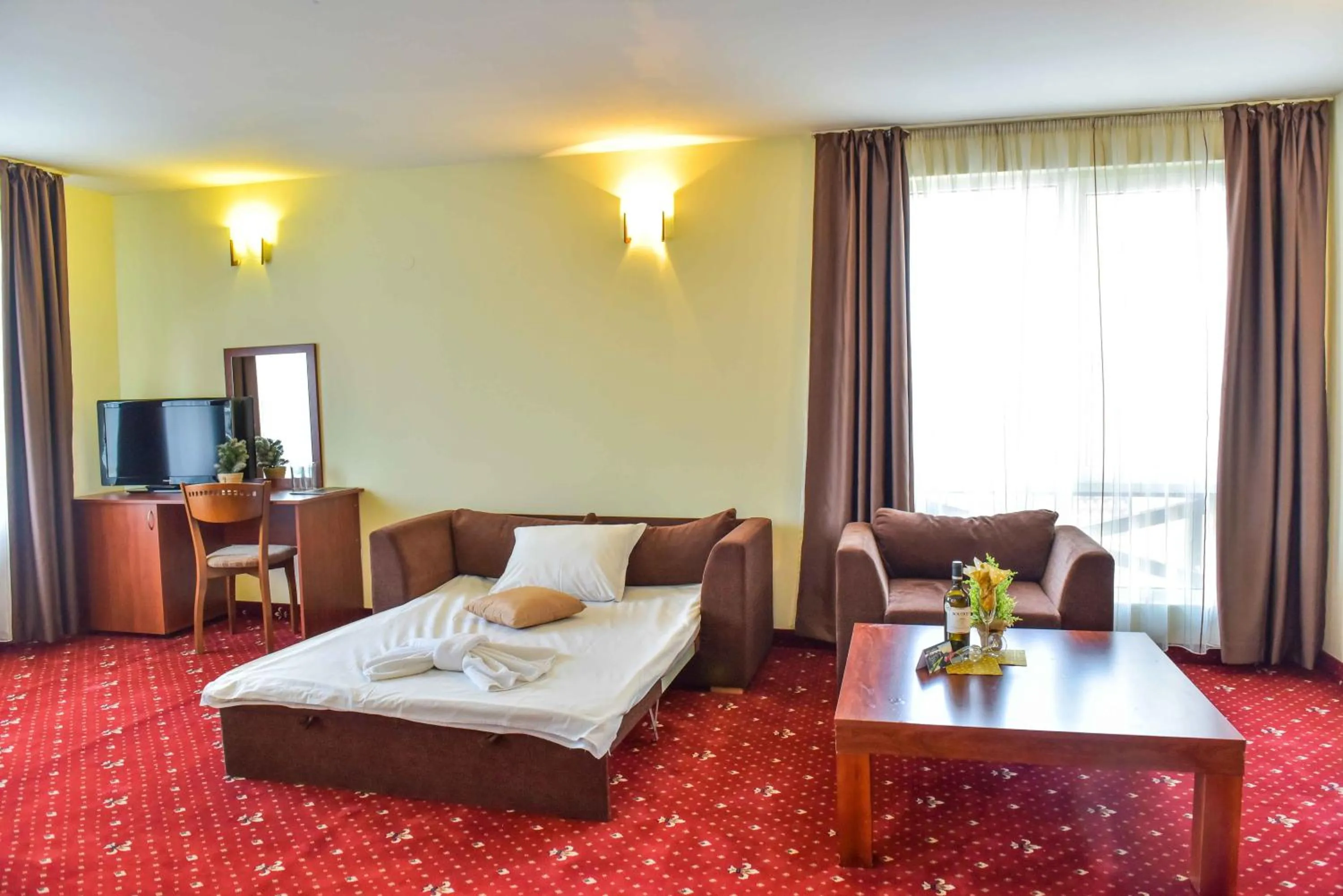 Photo of the whole room, Bed in Hotel Bojur & Bojurland Apartment Complex